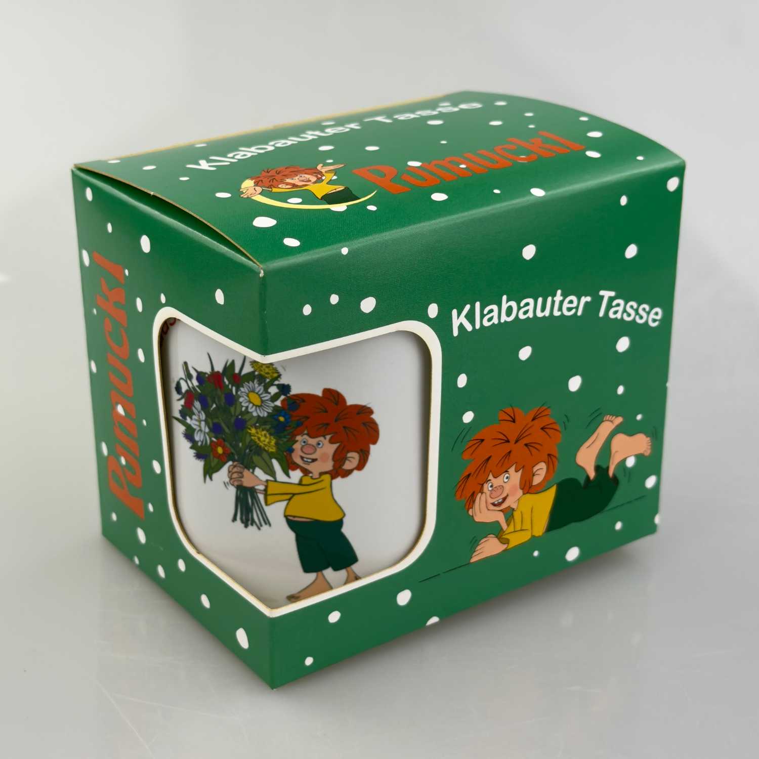 Pumuckl-Tasse in Geschenkbox – „Schee, dass di gibt.“ Motiv als liebevolles Geschenk mit grüner Verpackung und Pumuckl-Illustration