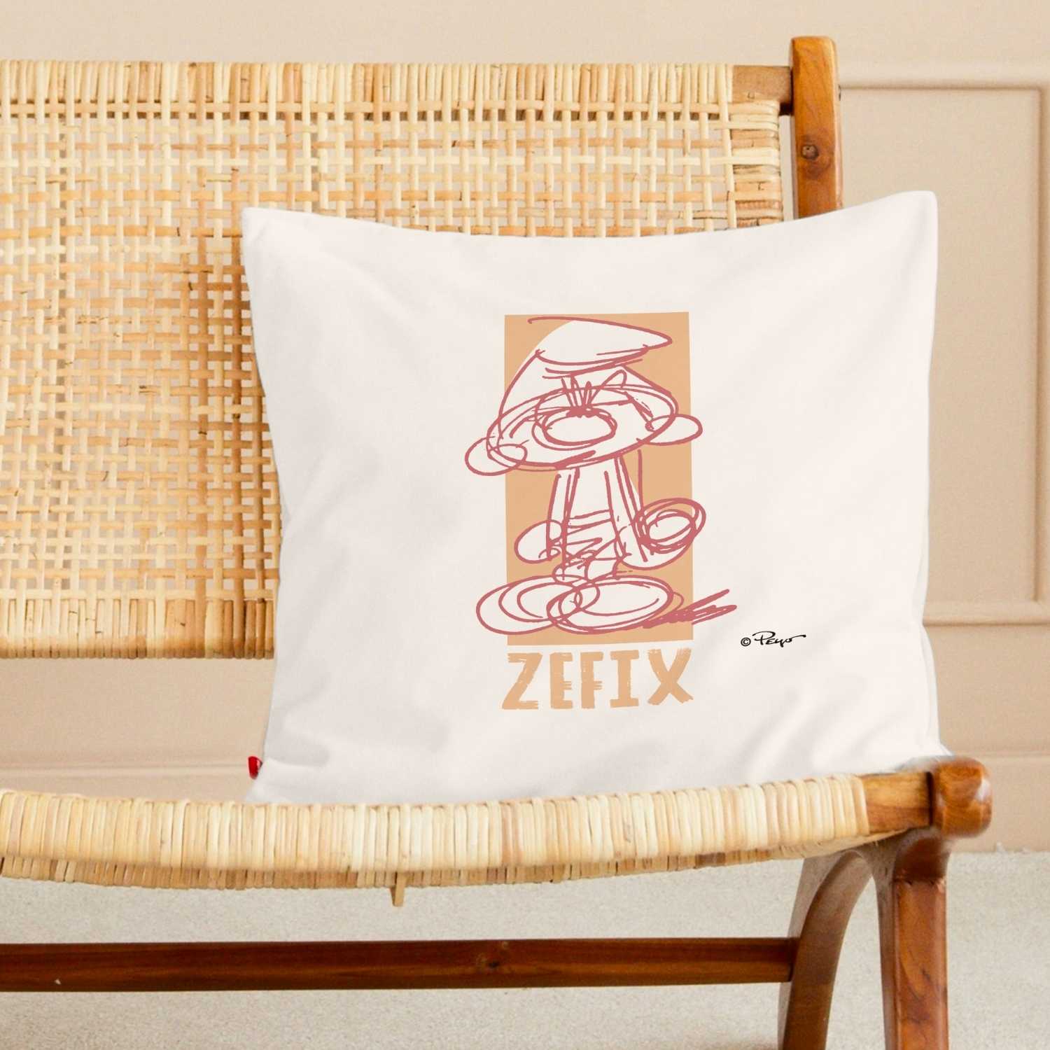 Quadratisches Kuschelkissen mit Schlumpf-Motiv und großem „Zefix“-Schriftzug, weiche Oberfläche, hochwertiger Druck.