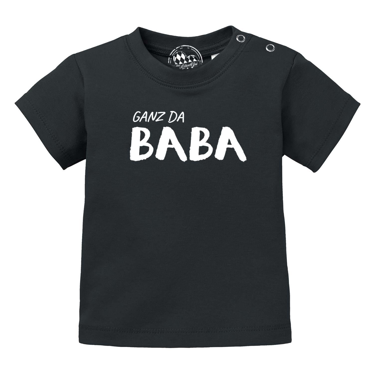 Schwarzes Baby T-Shirt Ganz da Baba mit weißem Aufdruck und praktischen Druckknöpfen an der Schulter.