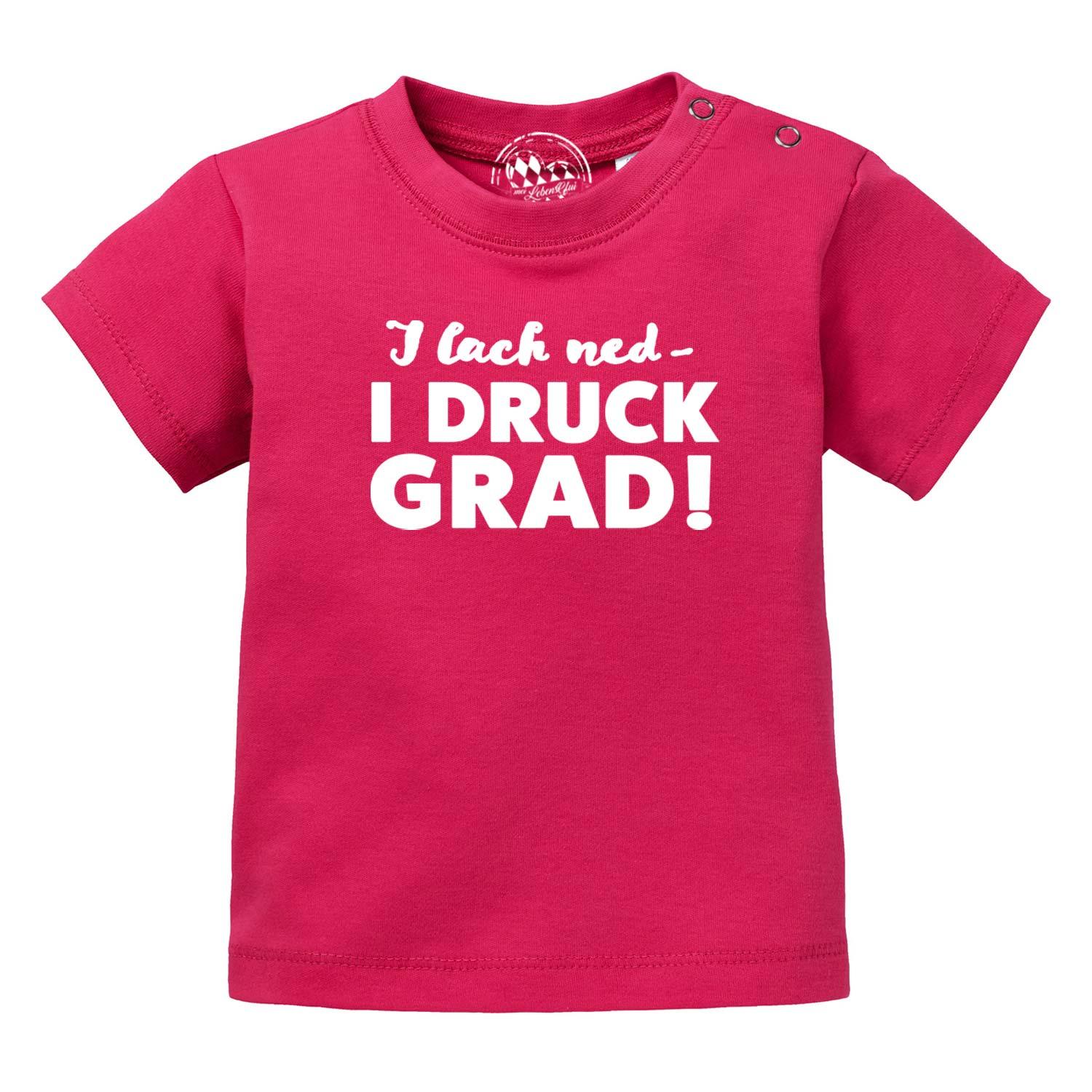 Weißes Baby-T-Shirt mit schwarzem Schriftzug „I lach ned...“, Rundhalsausschnitt, 100 % Bio-Baumwolle, Siebdruck.