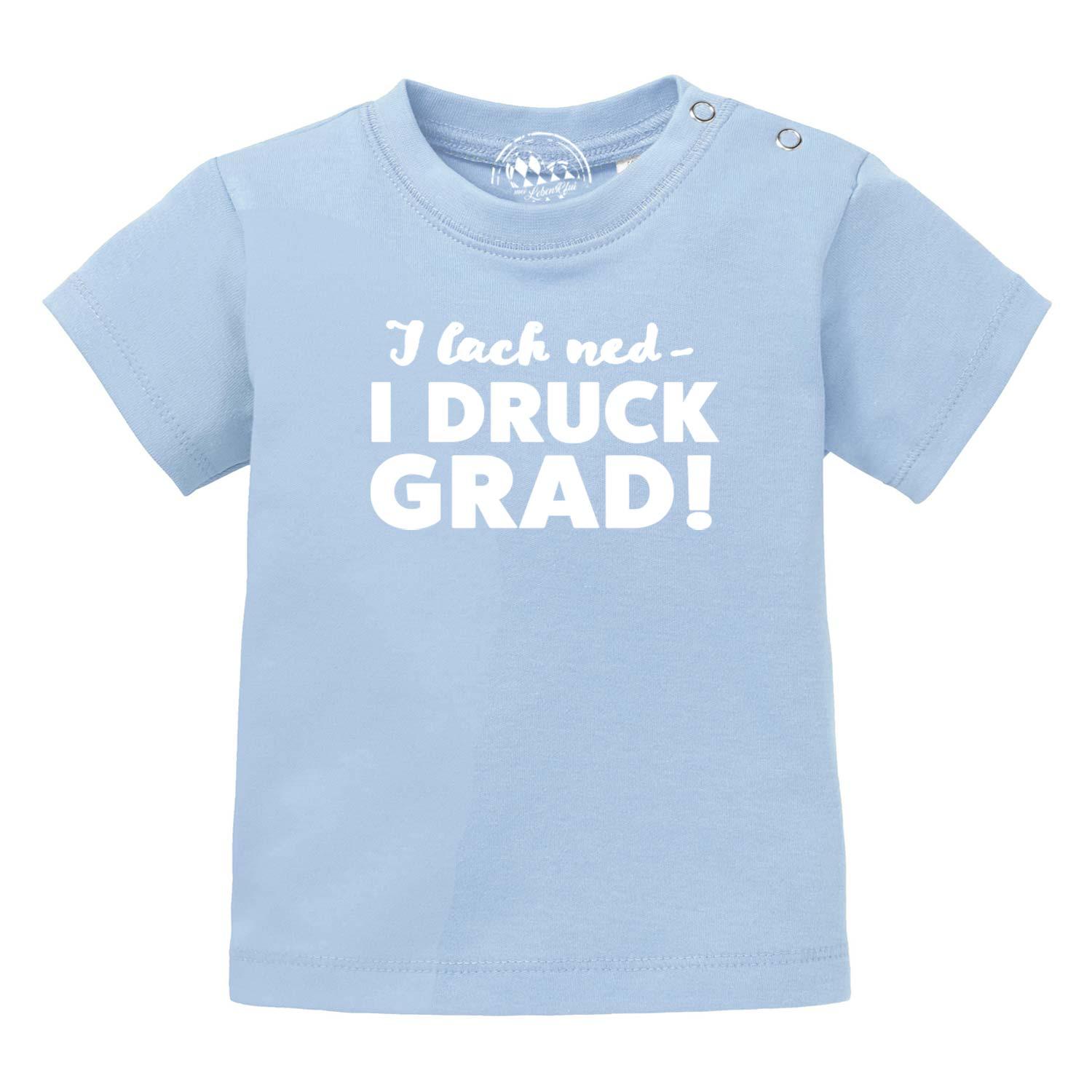 Kurzarmliges Baby-T-Shirt in Rosa mit schwarzem Frontprint „I lach ned…“, aus 100 % Bio-Baumwolle.