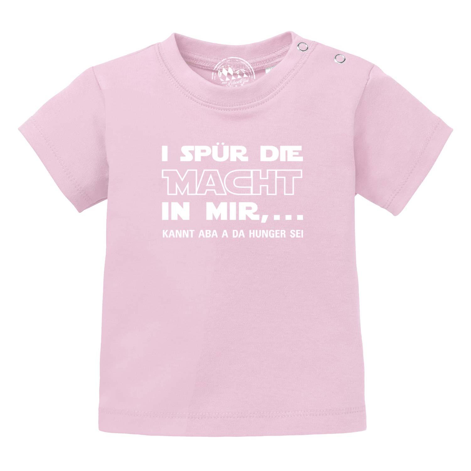 Baby-T-Shirt in Rosa mit schwarzem Aufdruck „I spür die Macht...“, Rundhalsausschnitt, 100 % Bio-Baumwolle.