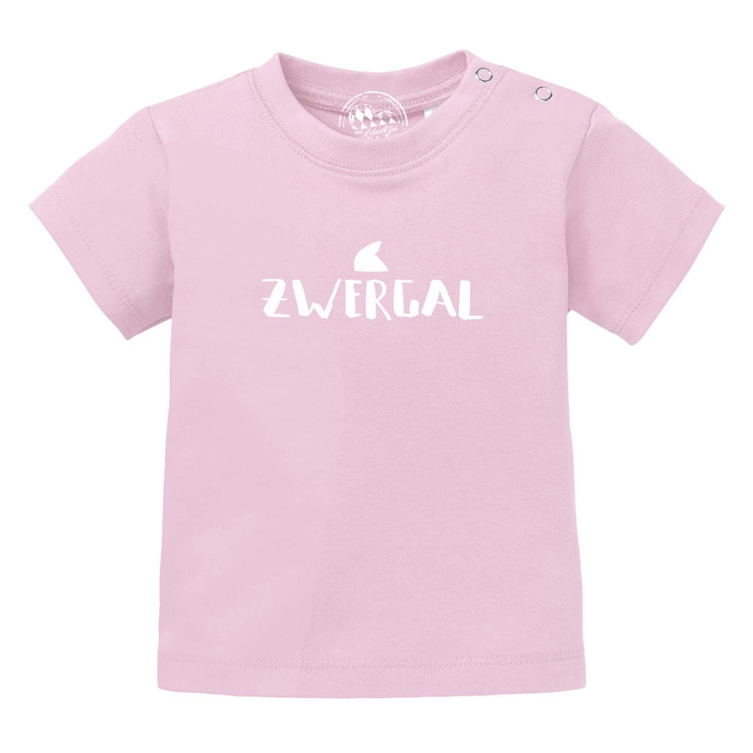 Hellbeiges Baby-T-Shirt mit dunkelblauem „Zwergal“-Schriftzug, Rundhalsausschnitt, aus 100 % Bio-Baumwolle.