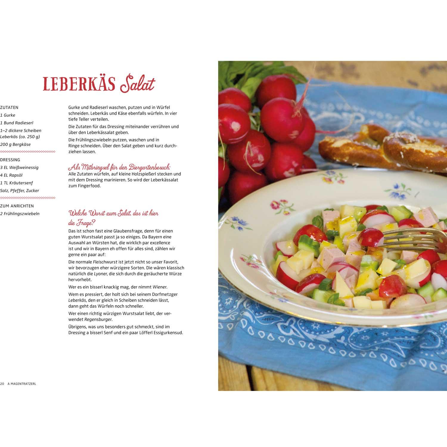 Kochbuch mit bayerischen Rezepten, rotem Einband, weißer Schrift und dekorativer Brezn auf dem Cover, ca. 16 × 24 cm.