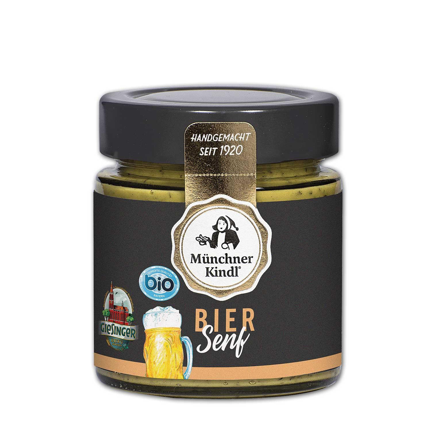 Mitteldunkler, grobkörniger Biersenf mit sichtbaren Gewürzen in Glas mit braunem Papieretikett und schwarzem Schriftzug.