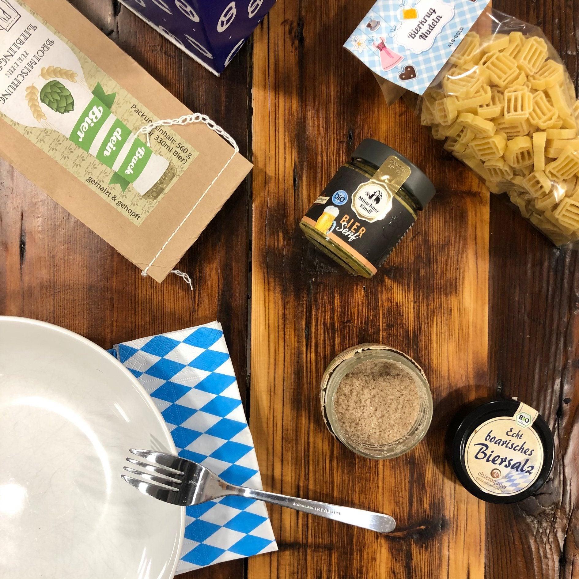Mittelscharfer Bio-Senf mit kräftigem Bieraroma, goldgelb, cremige Textur, 125 ml Glasbehälter.