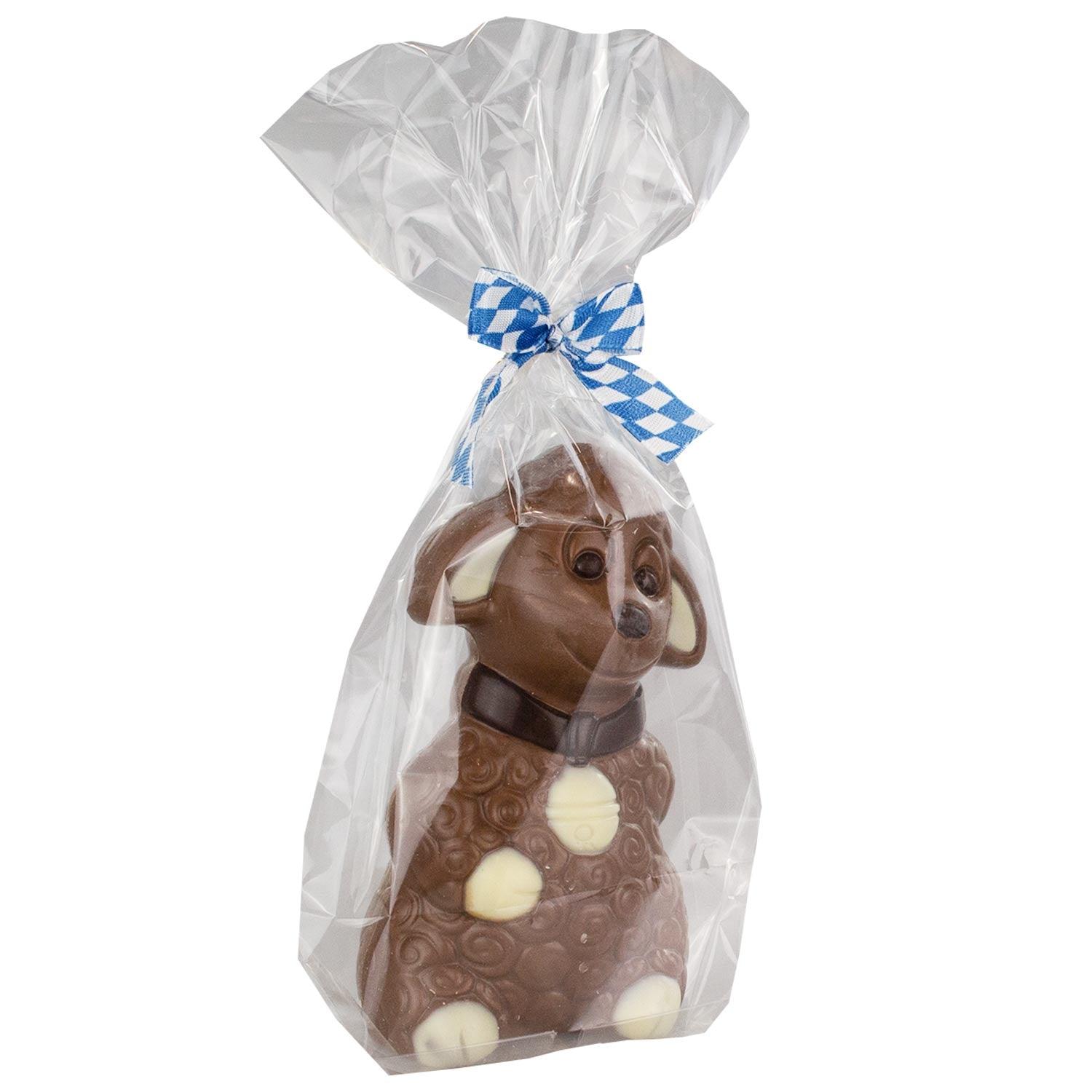 Schaffigur aus Vollmilchschokolade mit Details aus weißer und Zartbitterschokolade, ca. 10 × 5,5 cm, 70 g.