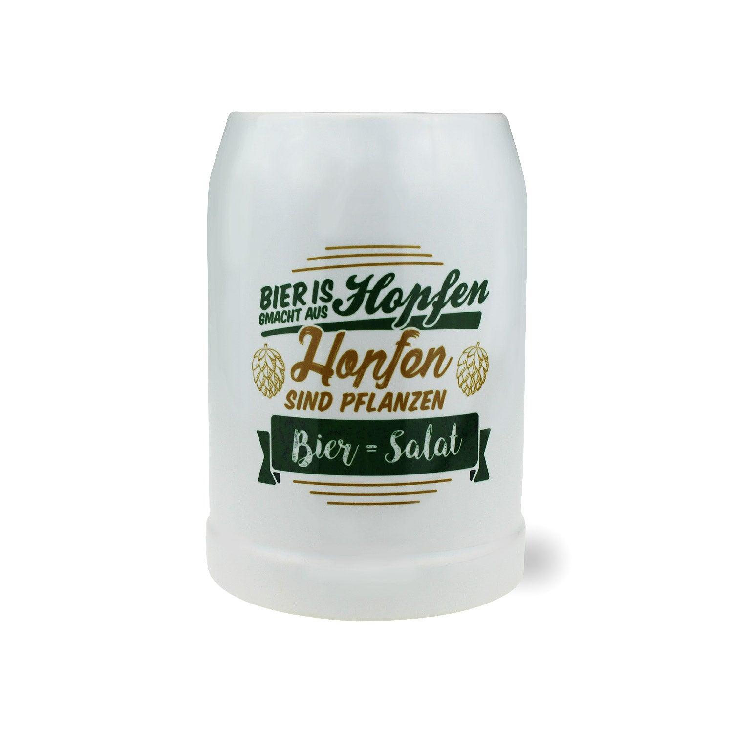 Weißer Bierkrug mit rundem Henkel und schwarzem Motiv „Bier = Salat“, Füllmenge 0,5 l, ca. 126 mm hoch.