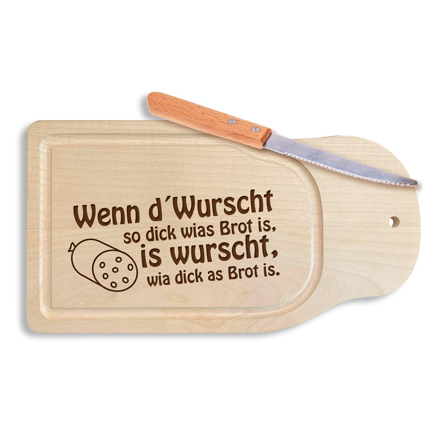 Rechteckiges Brotzeitbrett aus hellem Ahornholz mit dunklem Schriftzug „Wenn d’Wurscht so dick wias Brot is“.