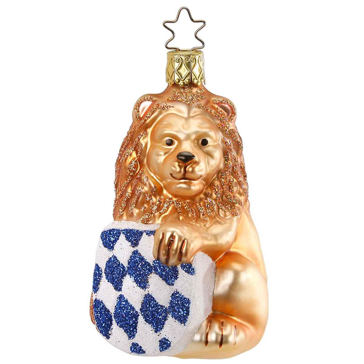 Christbaumanhänger aus Glas in Form eines gold-blauen Löwen mit Krone, silberverspiegelt, mundgeblasen, 10 × 5 × 6 cm.