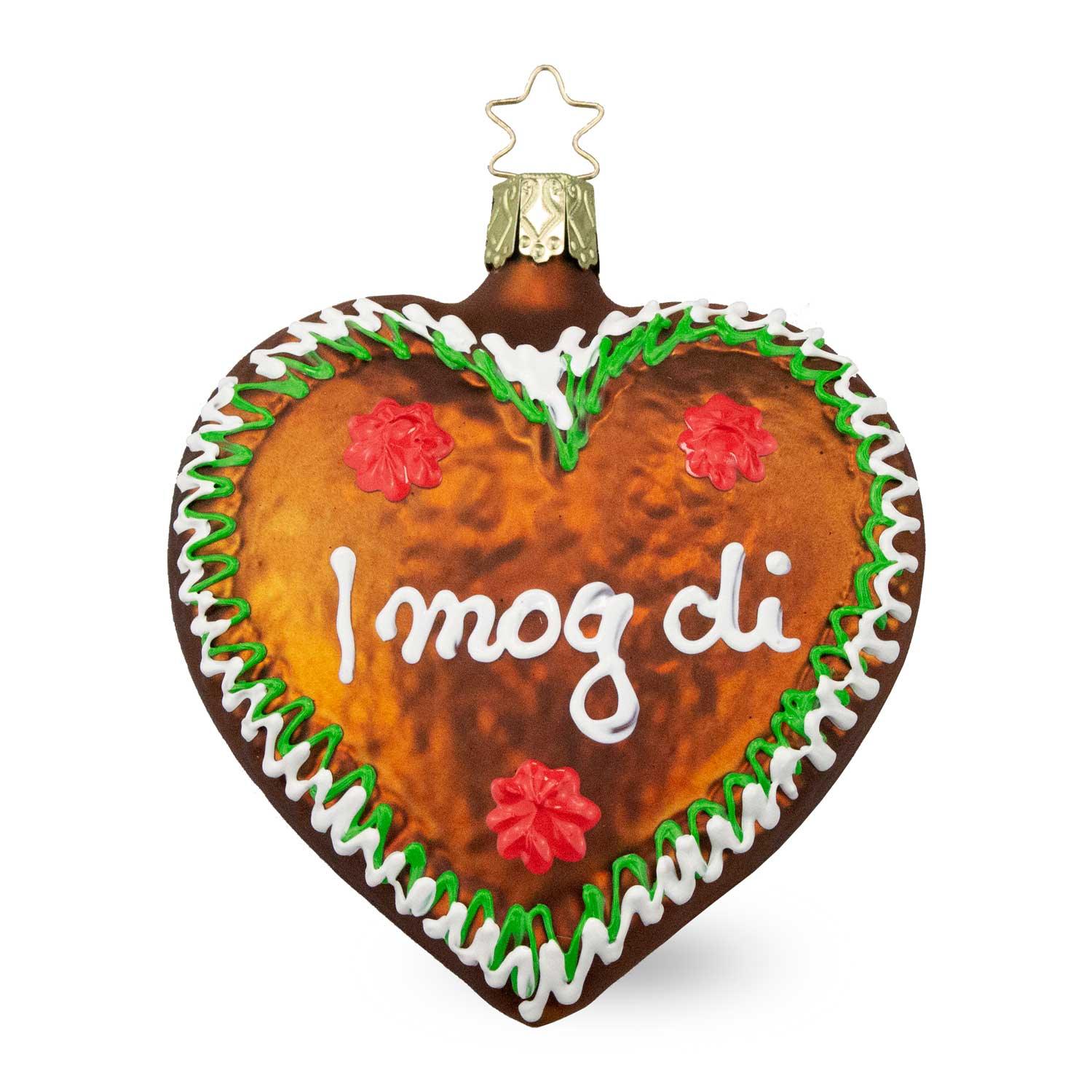 Mundgeblasenes Lebkuchenherz aus Glas mit Zuckerdekor-Optik und Schriftzug „I mog di“ als Christbaumschmuck.