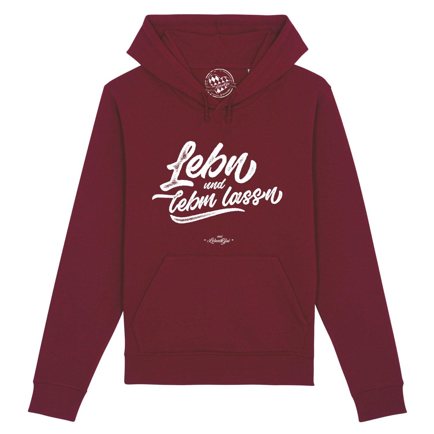 Damen Hoodie in Dunkelgrau mit weißem Frontdruck „Lebn und lebm lassn“ in Handschrift-Optik, Kapuze, Kängurutasche; aus 85 % Bio-Baumwolle und 15 % recyceltem Polyester.