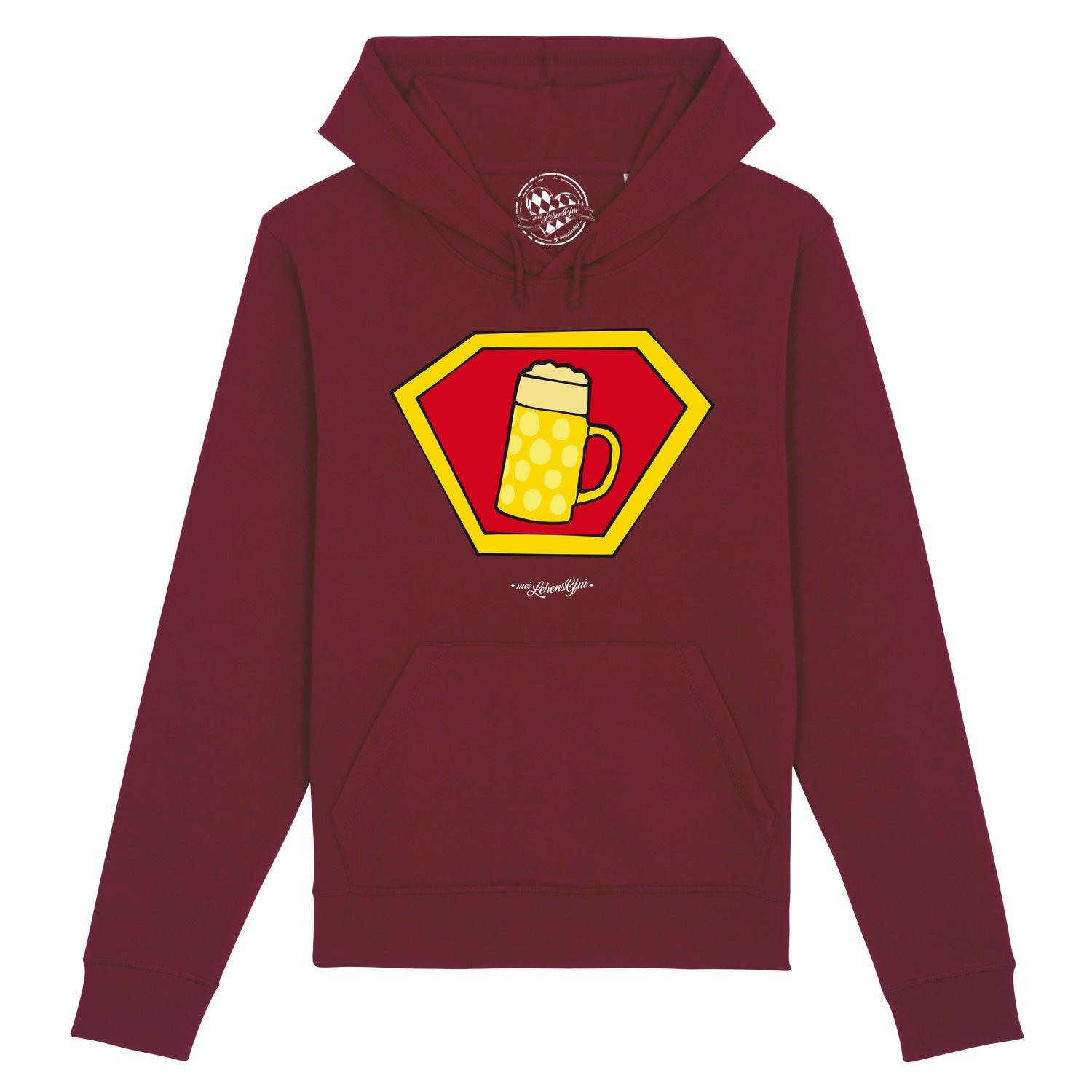 Damen Hoodie in Dunkelblau mit großem Superhelden-Bierkrug-Motiv und weißem Schriftzug „Super-Bierkrug“; Bio-Baumwolle.