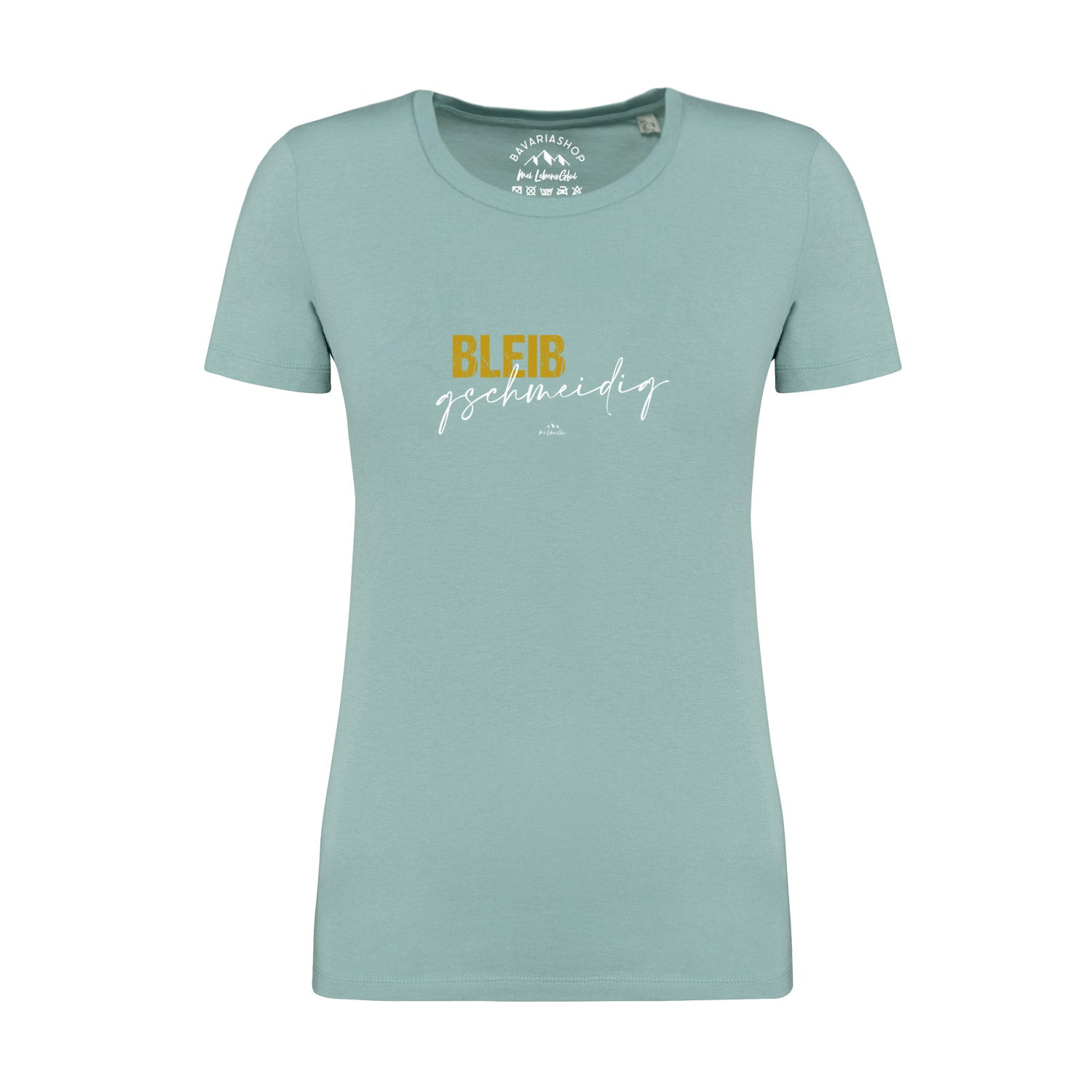 Pastellgrünes Damen-T-Shirt mit zentralem Schriftzug „Bleib gschmeidig“ in Weiß, aus 100 % Bio-Baumwolle.
