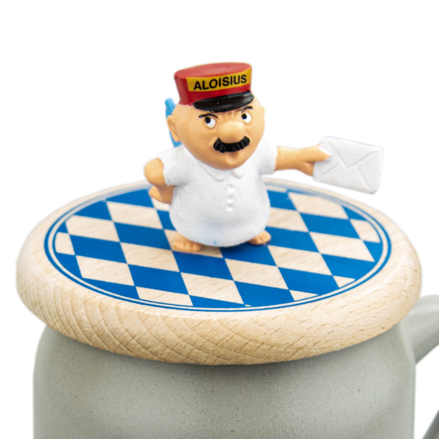 Engel Aloisius Bierdeckel „Engerl“ mit bayerischem Rautenmuster und Aloisius-Figur auf Steinkrug.