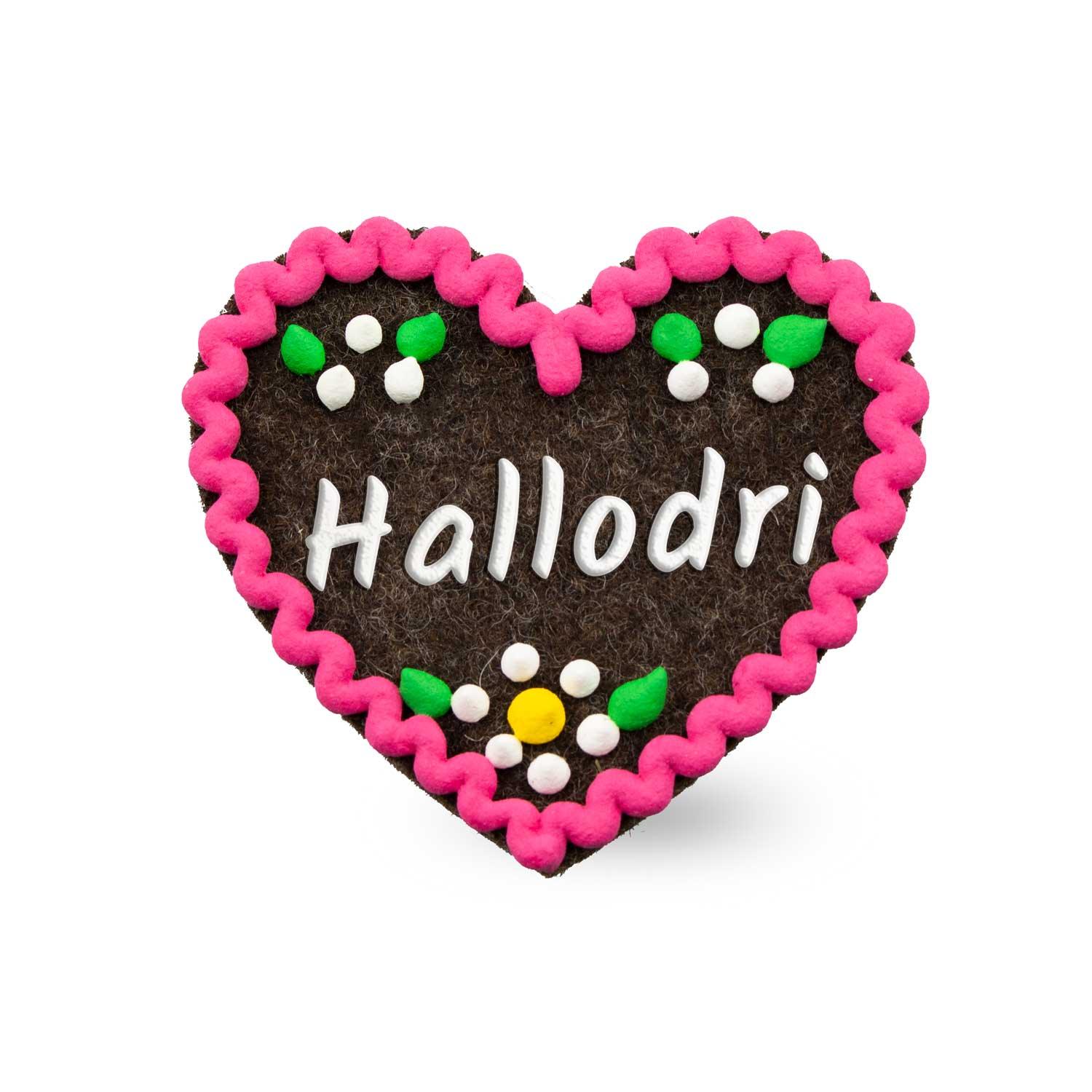 Filzherz-Anstecker in Herzform mit gesticktem Schriftzug „Hallodri“ und Sicherheitsverschluss auf der Rückseite, ca. 6,5 × 7 cm.