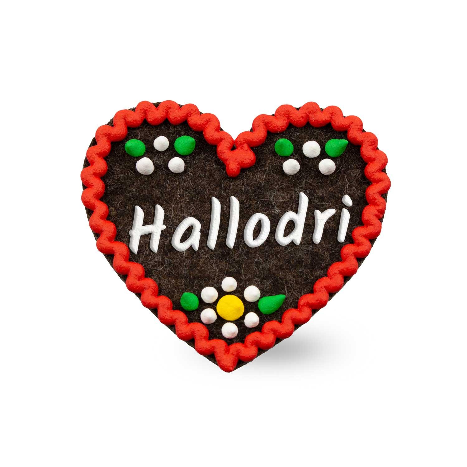 Filzherz-Anstecker mit gesticktem Schriftzug „Hallodri“, Sicherheitsverschluss auf der Rückseite, ca. 6,5 x 7 cm.