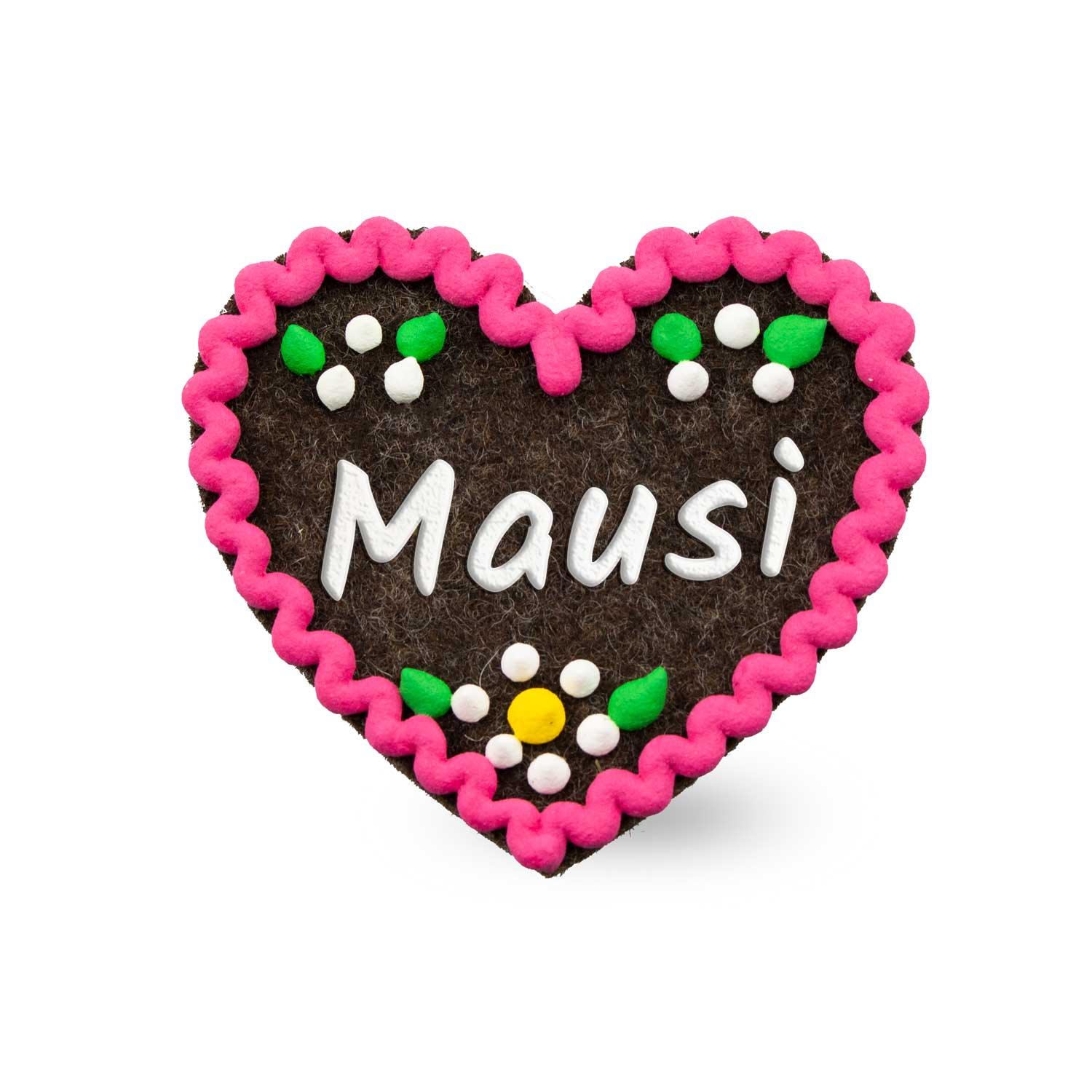Herzförmiger Filz-Anstecker mit Schriftzug „Mausi“ in kontrastfarbener Stickerei; mit Sicherheitsverschluss, ca. 6,5 x 7 cm.