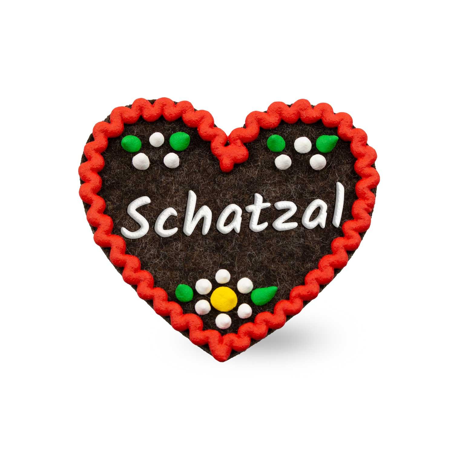 Filzherz-Anstecker in Herzform mit Stickschrift „Schatzal“ und Sicherheitsverschluss; ca. 6,5 x 7 cm, Filz, 3 mm dick.