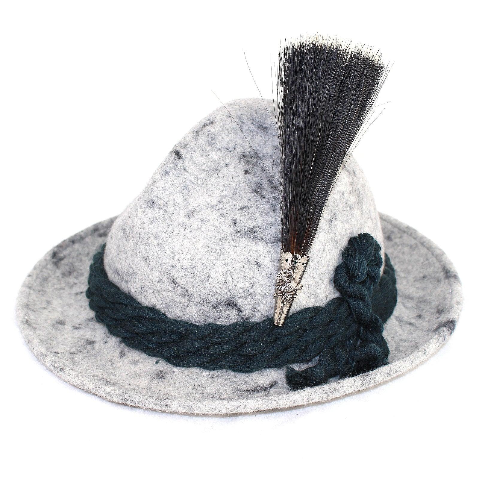 Traditioneller Gamsbart aus dunklem Antilopenhaar mit silberner Barthülse und Auerhahn-Applikation, ca. 15 cm.