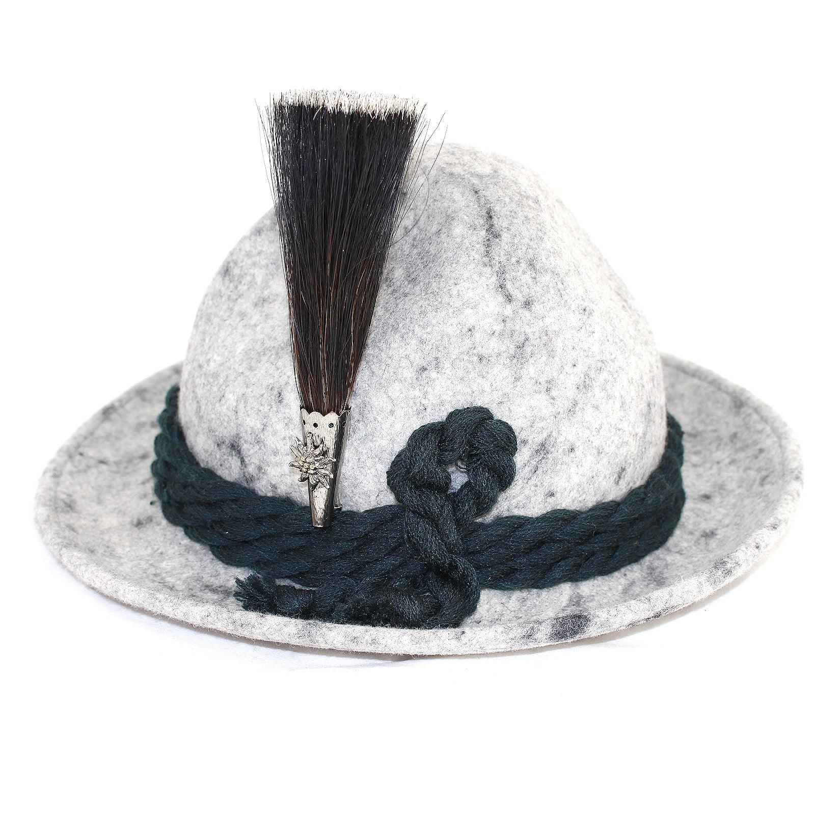 Traditioneller Gamsbart mit Edelweiß-Anstecker, handgebunden aus Antilopenhaar in Braun, ca. 13 cm hoch.