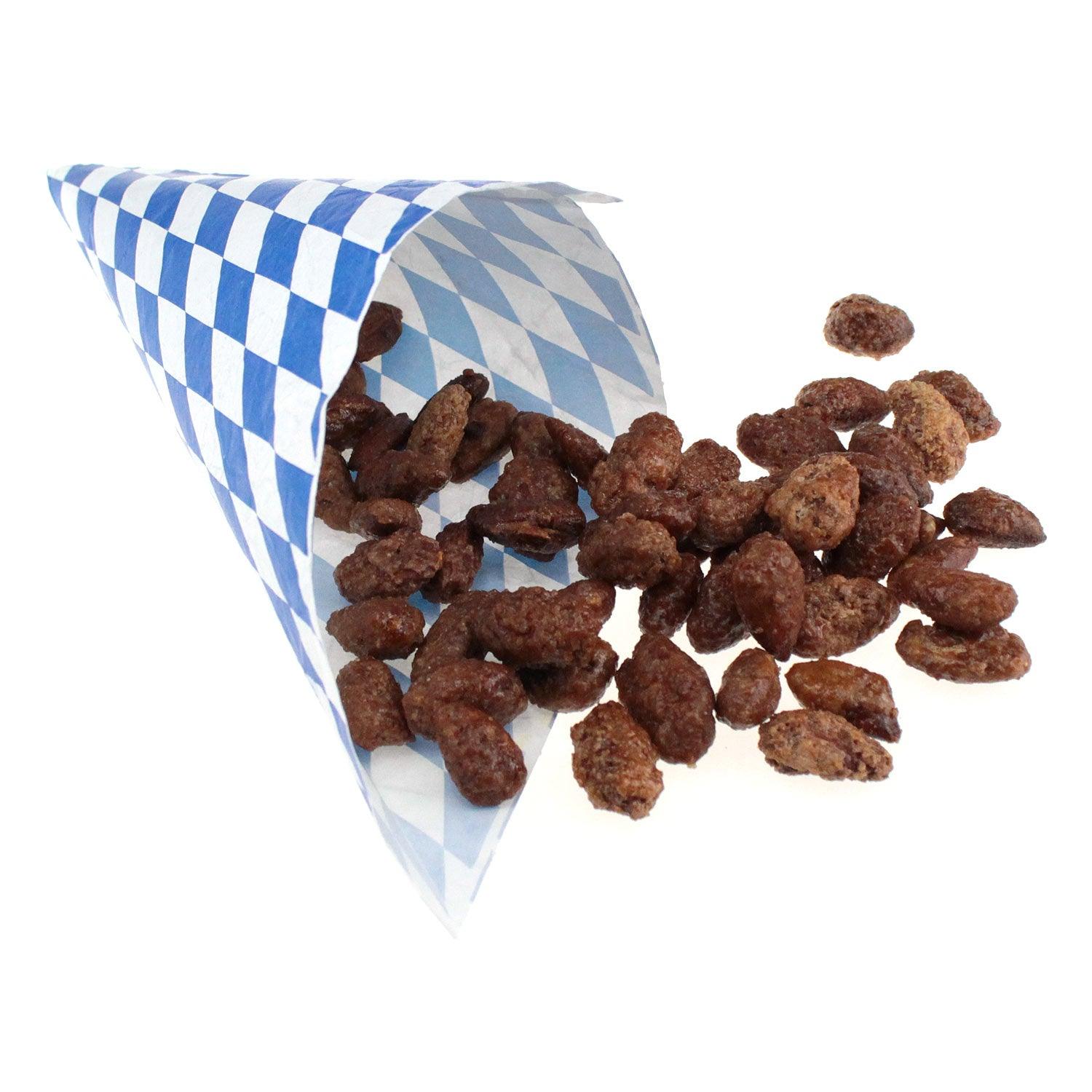 Gebrannte Mandeln mit Zucker und Zimt in glasiertem Braun, lose in weiß-blauer Papierspitztüte, 100 g, MHD 30.03.2025.