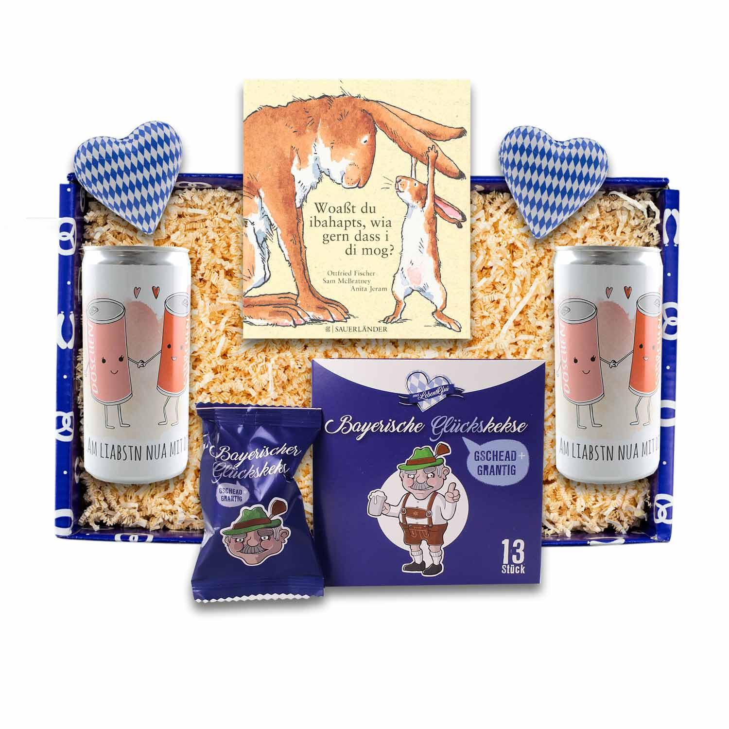 Geschenkbox mit zwei Secco-Dosen mit Aufschrift, Buch in bayerischer Mundart und Grantler-Glückskeks in Naturkarton.