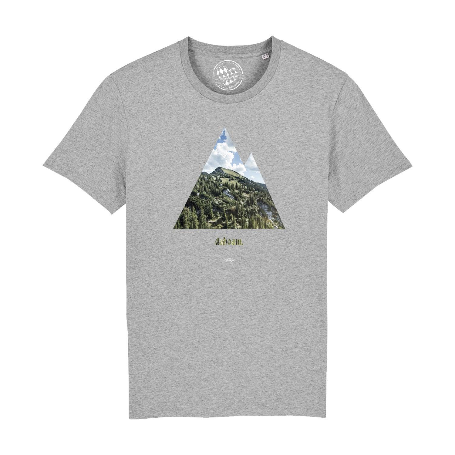 Schwarzes Herren-T-Shirt mit weißem Schriftzug „dahoam“ in bayerischer Mundart aus 100 % Bio-Baumwolle.