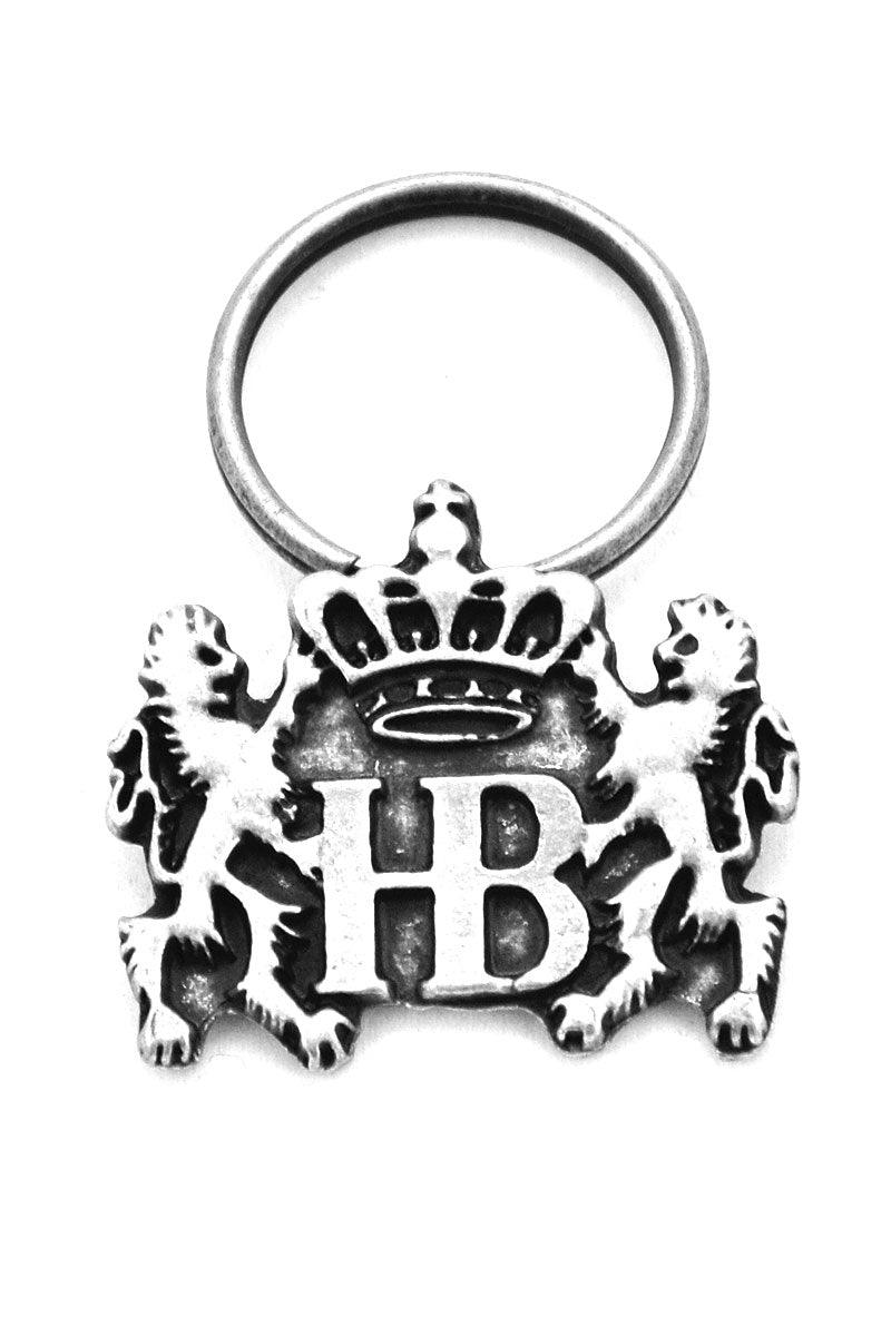 Schlüsselanhänger in Altsilber mit Löwe-Motiv, zwei Wappentieren und Hofbräuhaus-Logo aus Metall.