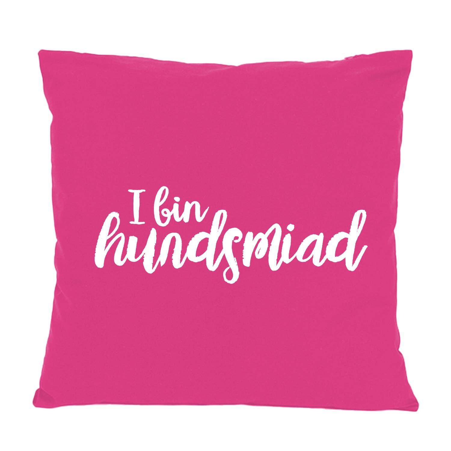 Quadratisches Kissen "Hundsmiad..." in leuchtendem Pink mit weißem Schriftzug, Text in geschwungener Handschrift.