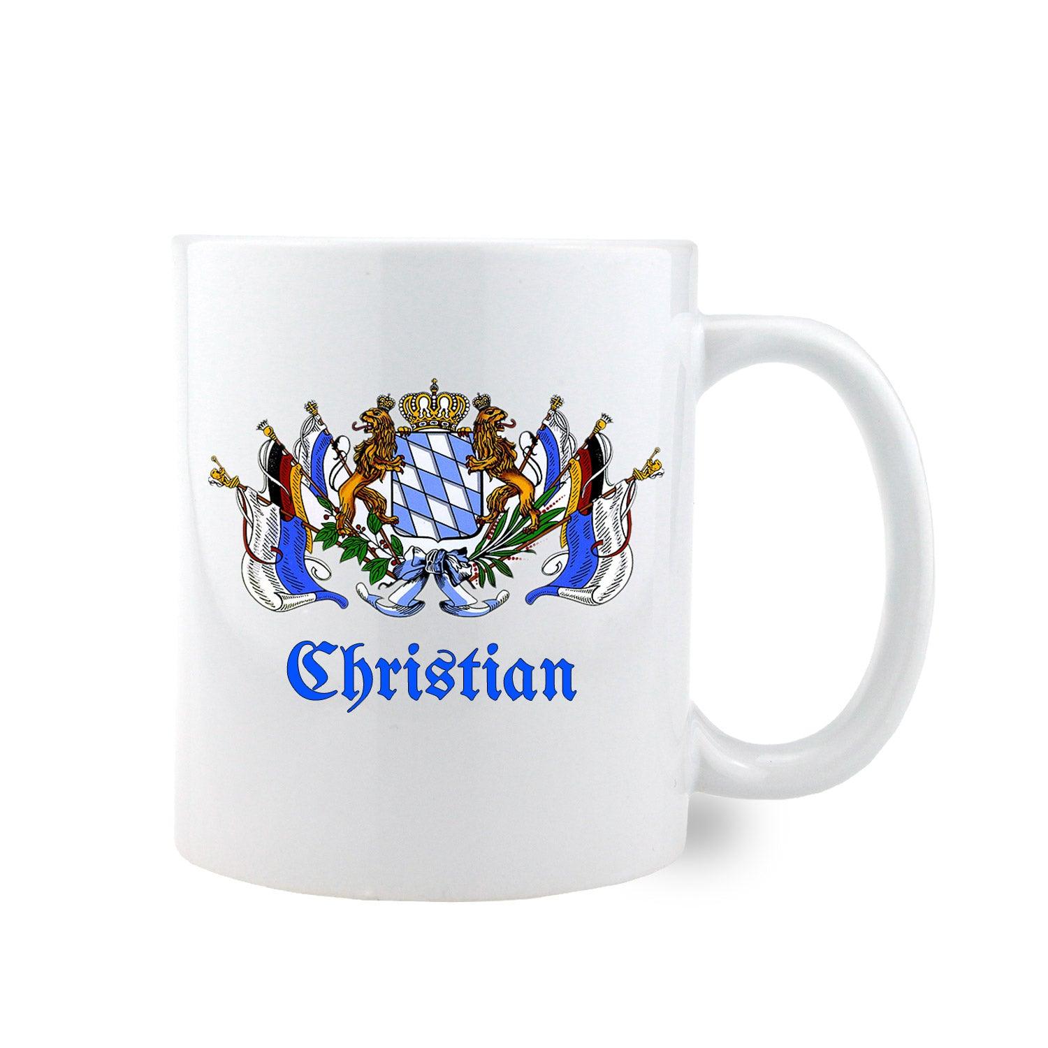 Weiße Kaffeetasse mit blauem Rautenmuster, Bayern-Wappen und personalisierbarem Namensaufdruck, 330 ml.