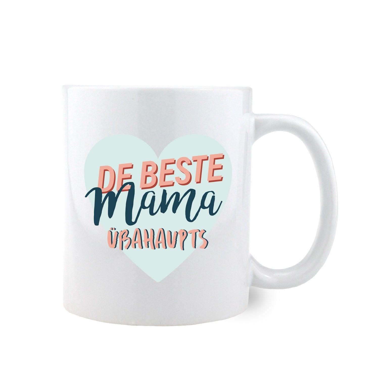 Weiße Keramiktasse mit rotem Henkel und innerer Farbfläche, Aufdruck „De beste Mama übahaupts“, ca. 330 ml.