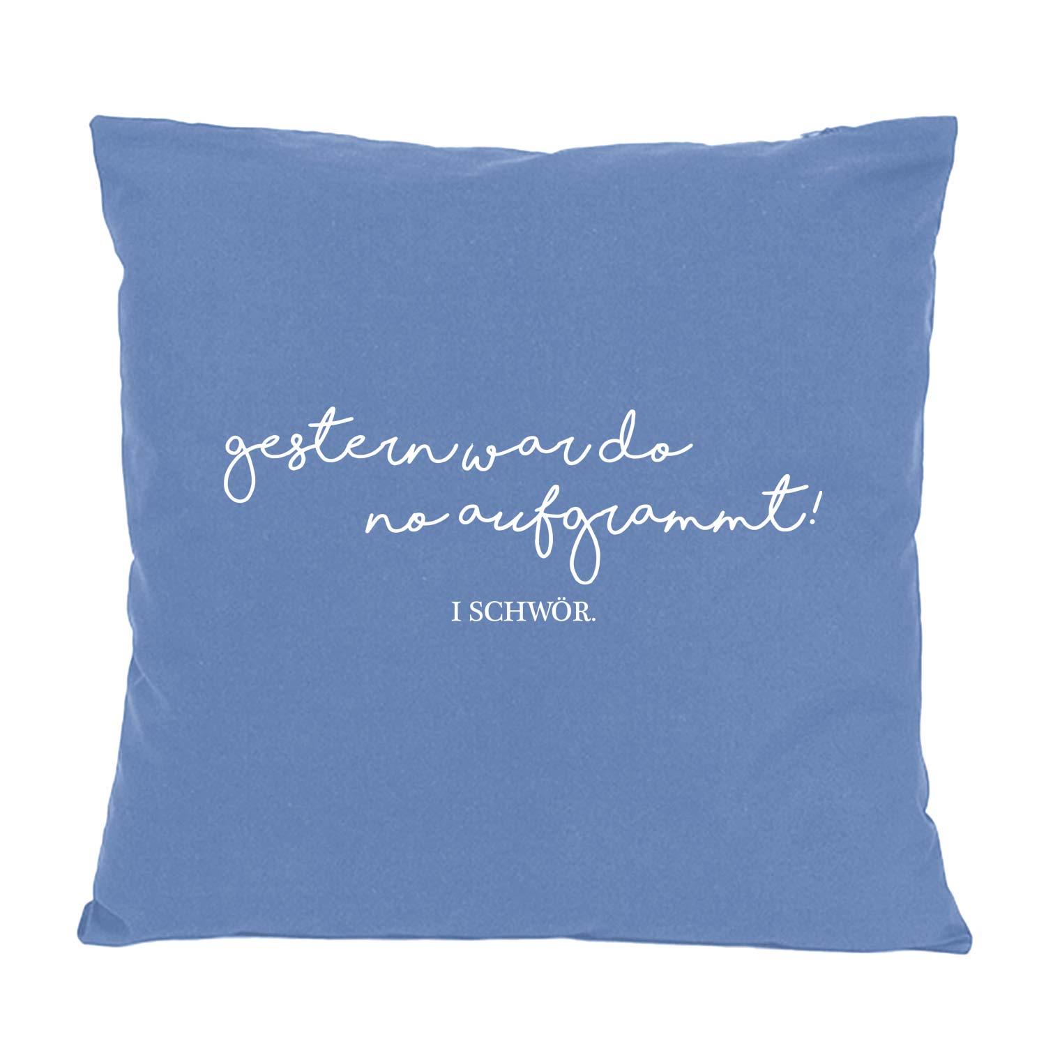 Quadratisches Dekokissen mit auffälligem Schriftzug „Aufgrammt...“ auf der Vorderseite, 100 % Baumwolle, ca. 40 x 40 cm.