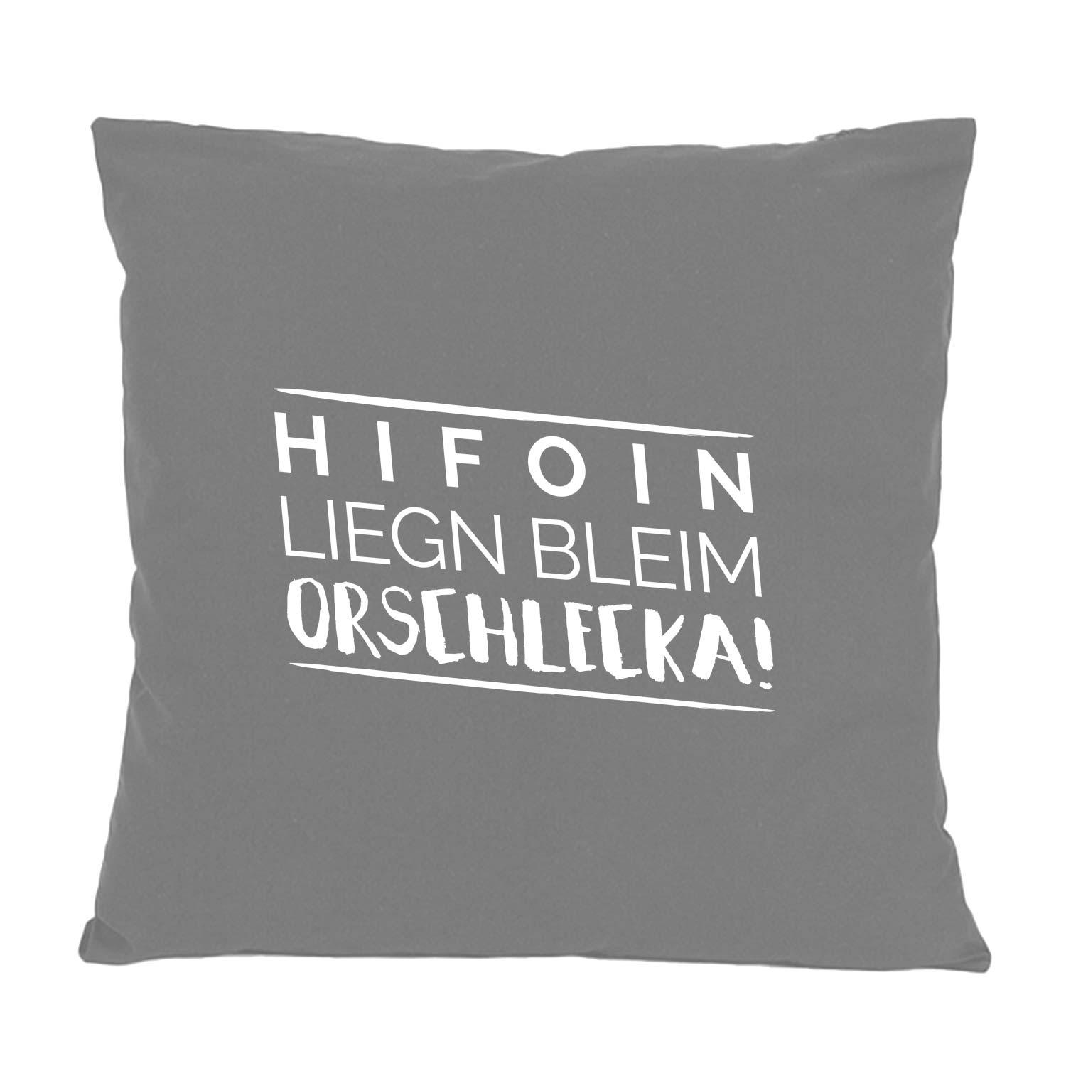 Quadratisches Dekokissen mit bayerischem Spruch „Hifoin liegn bleim...“, sichtbarer Schriftzug, aus 100 % Baumwolle, ca. 40 x 40 cm.