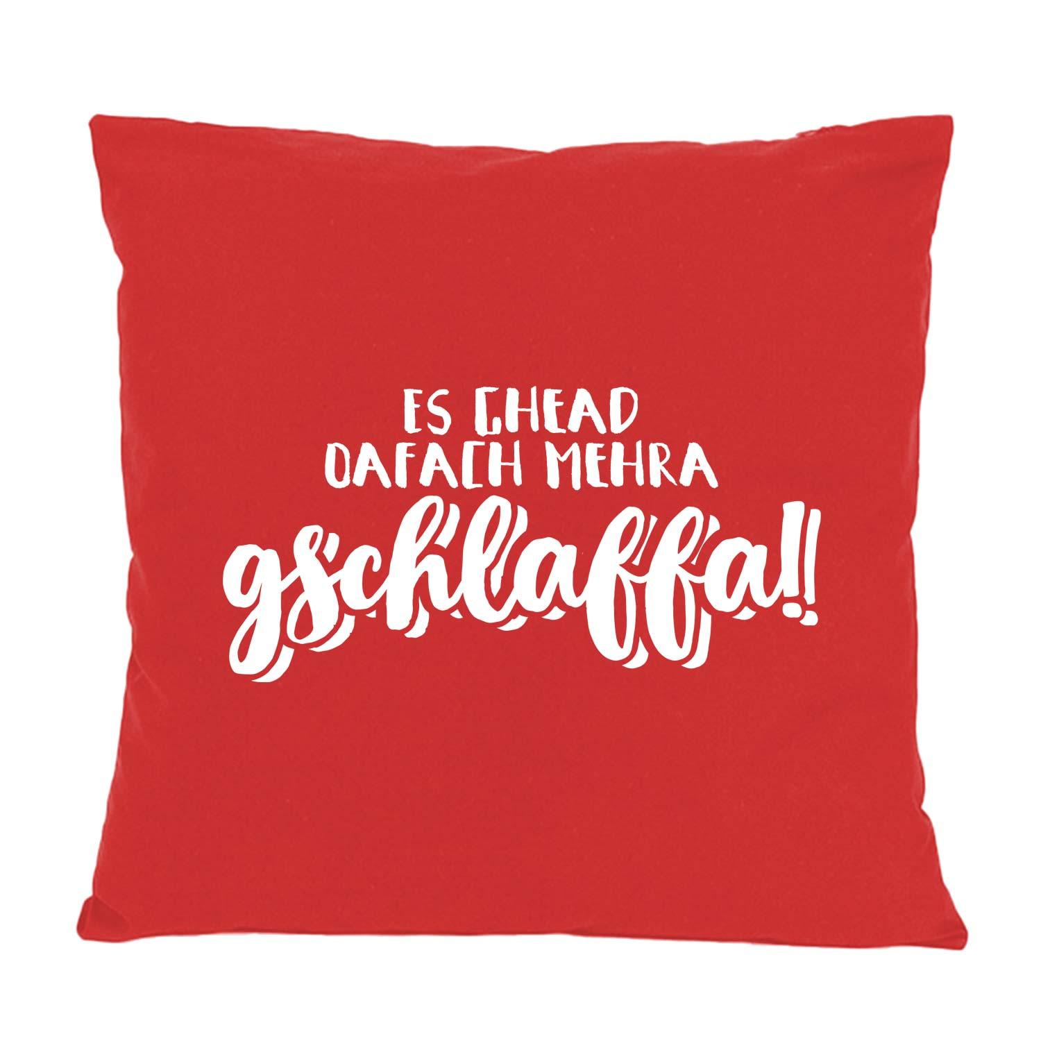Quadratisches Dekokissen mit aufgedrucktem bayerischen Schriftzug „oafach mehra gschlaffa...“, aus 100 % Baumwolle, ca. 40 × 40 cm.