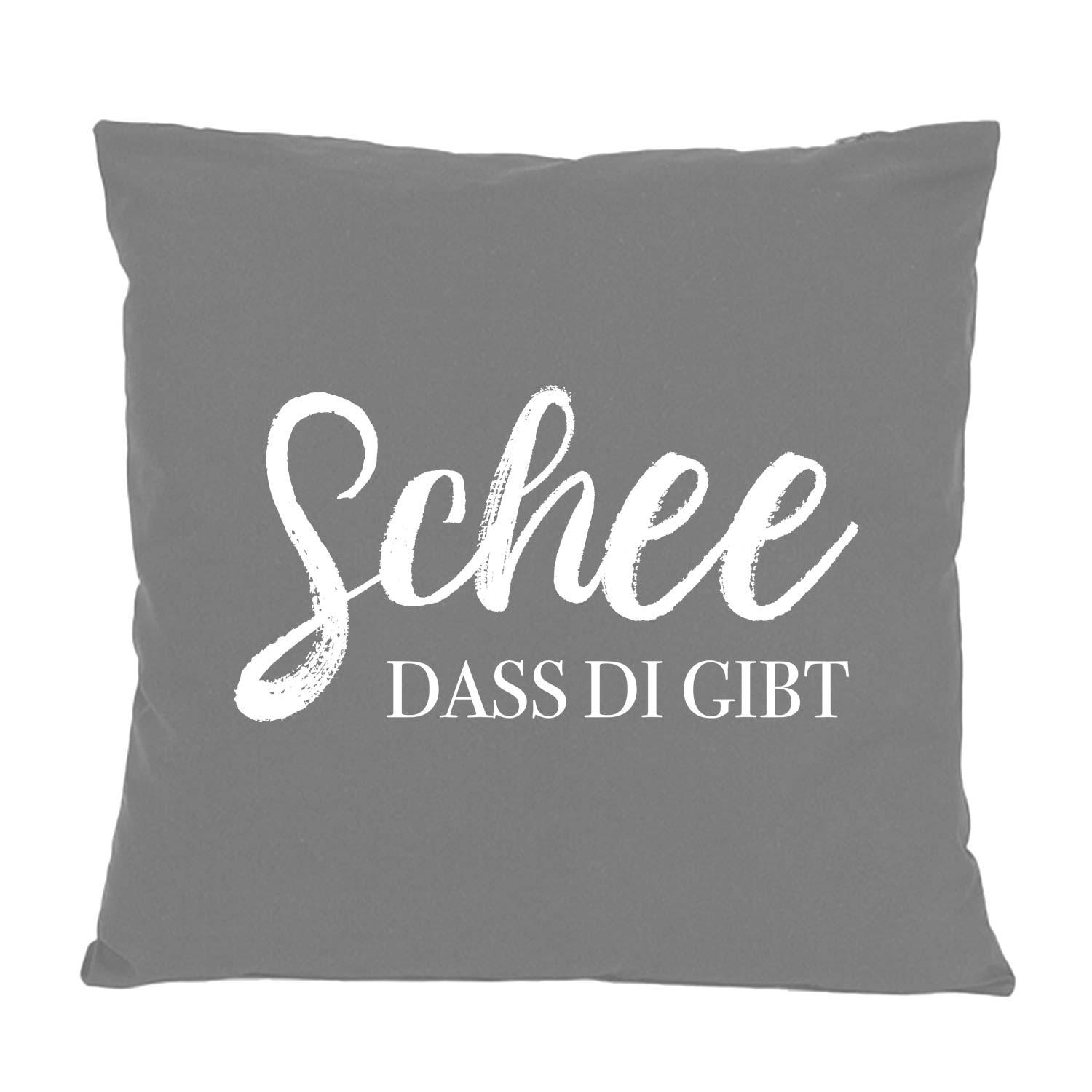 Quadratisches Dekokissen mit aufgedrucktem Schriftzug „Schee, dass di gibt!“, aus Baumwolle, ca. 40 × 40 cm.