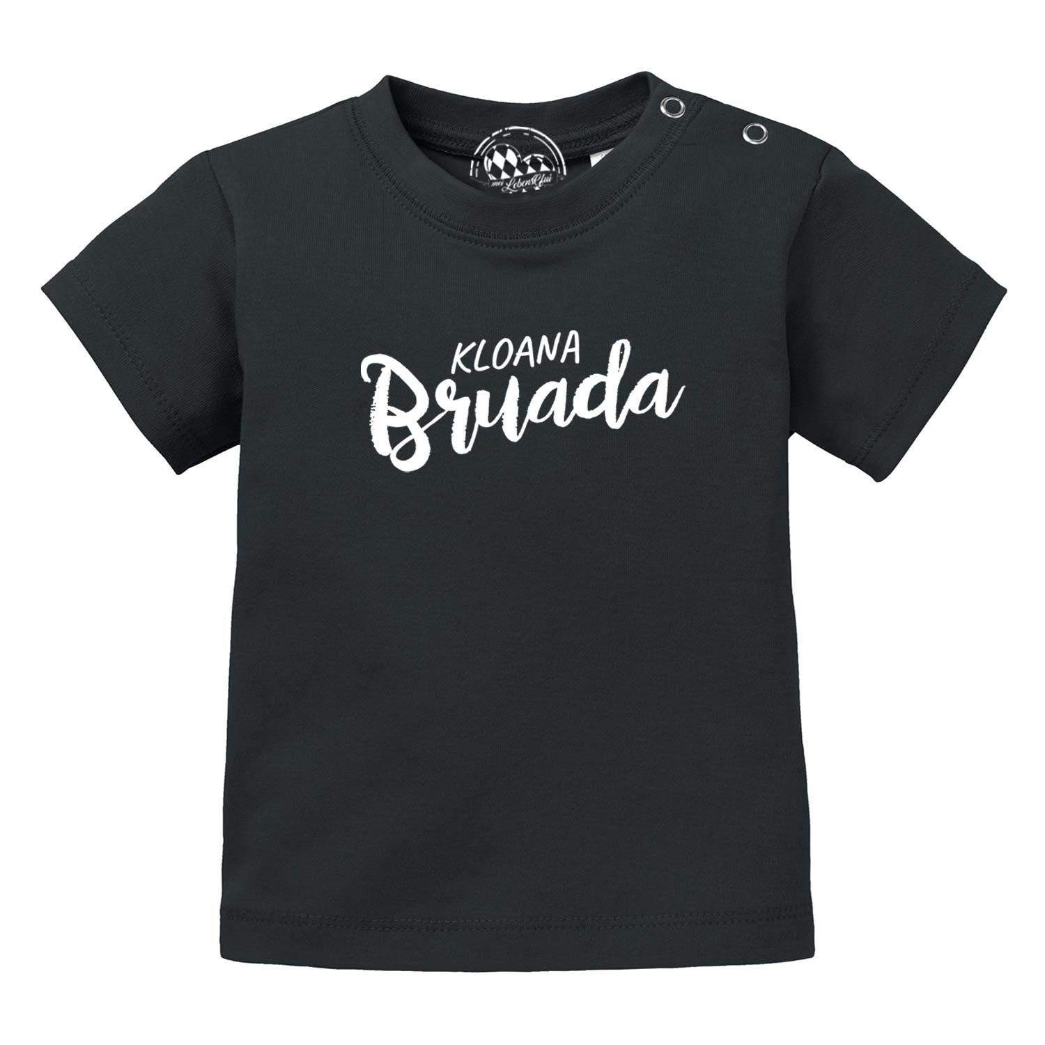Schwarzes Baby T-Shirt Kloana Bruada mit weißem Schriftzug und Druckknöpfen an der Schulter, aus Baumwolle.