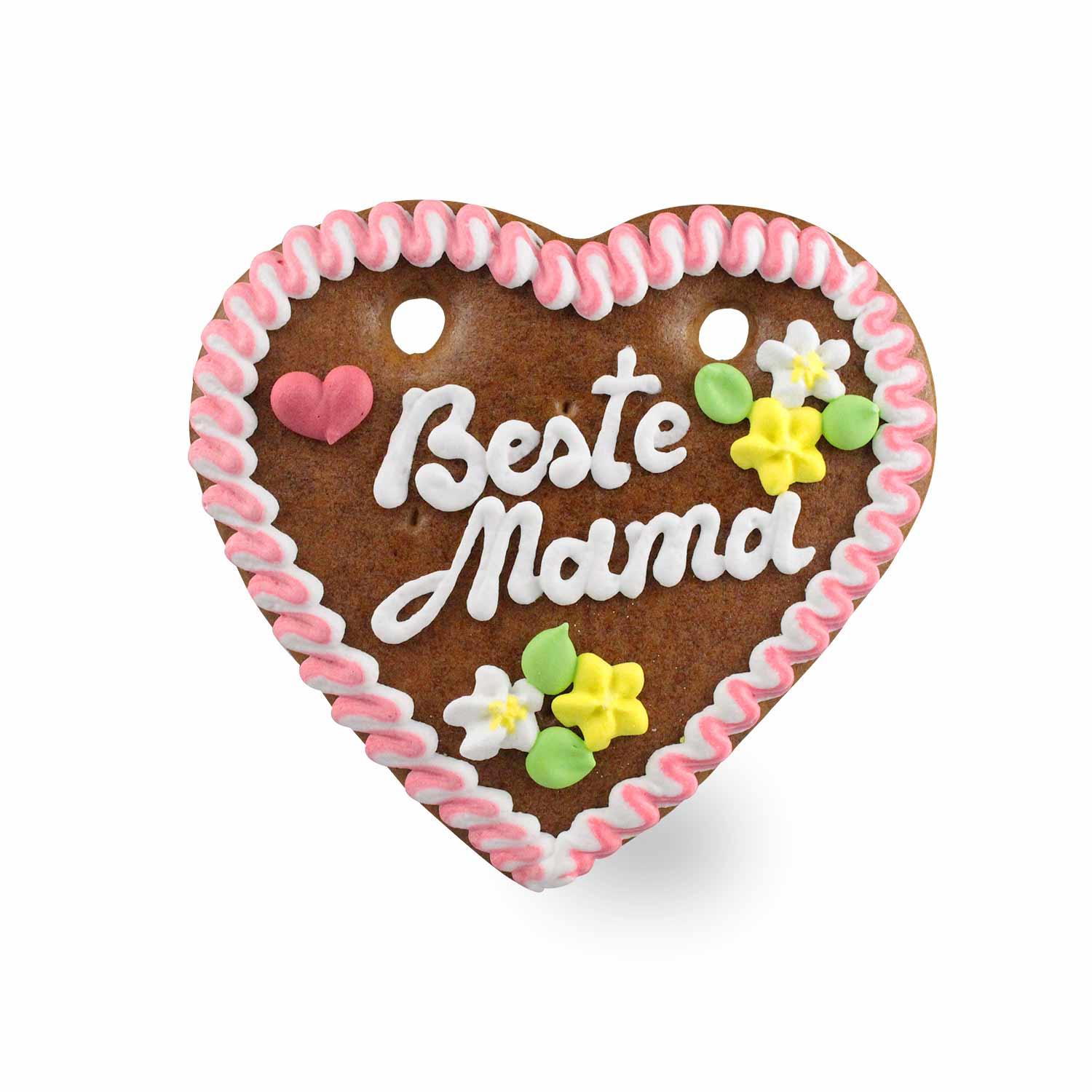 Herzförmiges Lebkuchen mit weißer und rosa Zuckerdekoration und Aufschrift „Beste Mama“, handgefertigt in Bayern, ca. 14 x 17 cm.