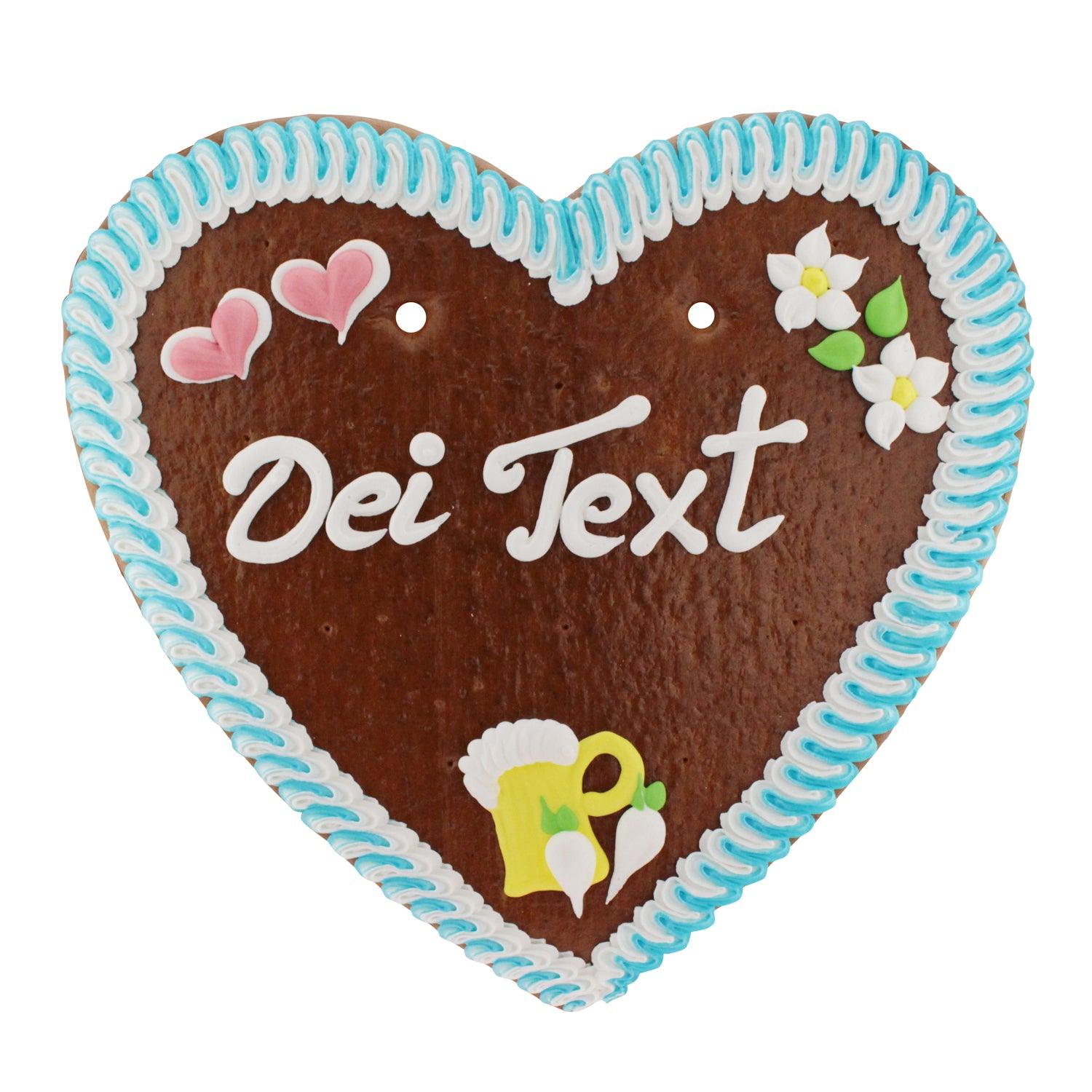 Großes Lebkuchenherz mit weißer Zuckerverzierung, rosa Rand, Blumen-Dekor und individuellem Wunschtext. Ca. 50 x 48 cm.
