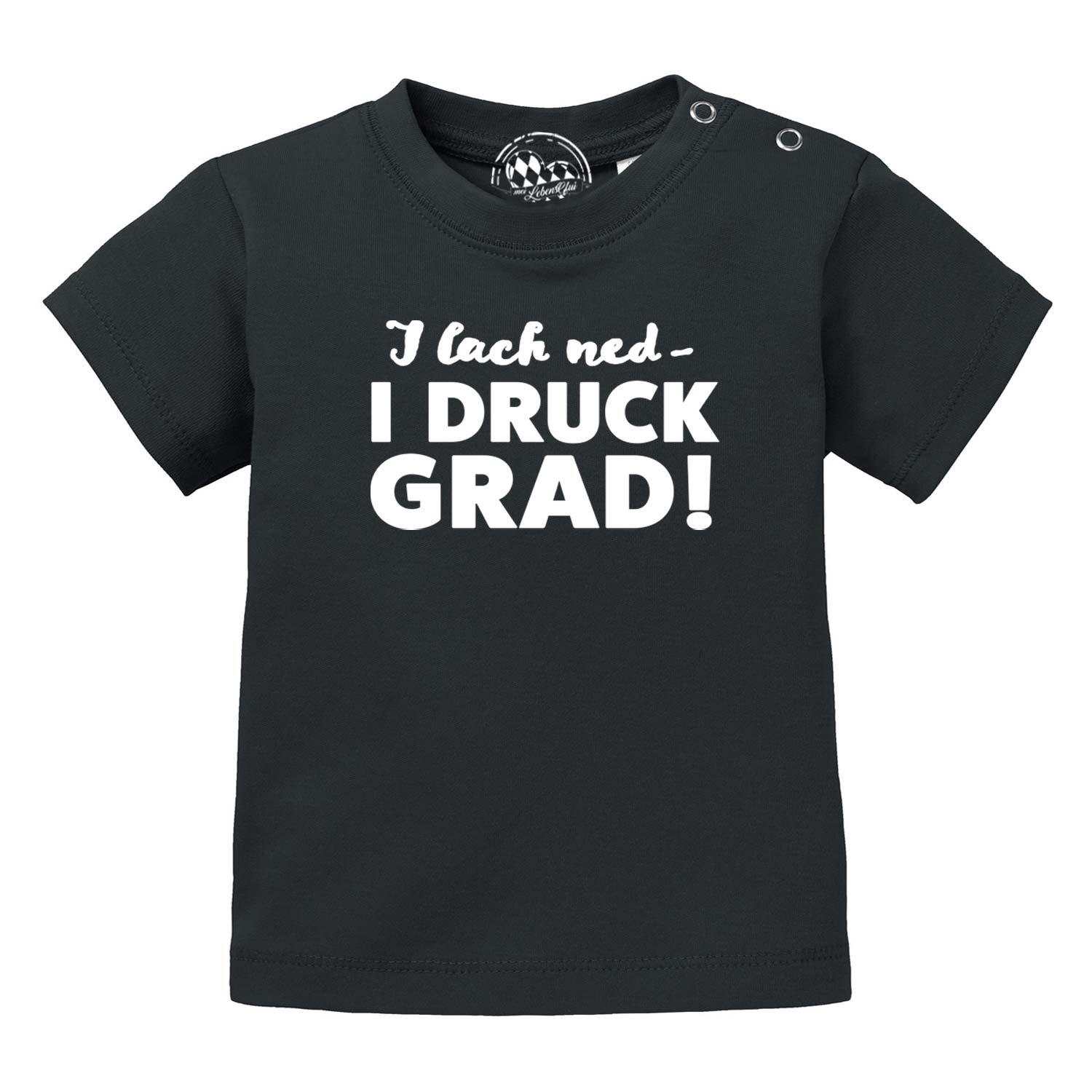 Baby T-Shirt "I lach ned…" in Schwarz mit weißem bayerischem Spruch, kurzen Ärmeln und Druckknöpfen an der Schulter, bequem.