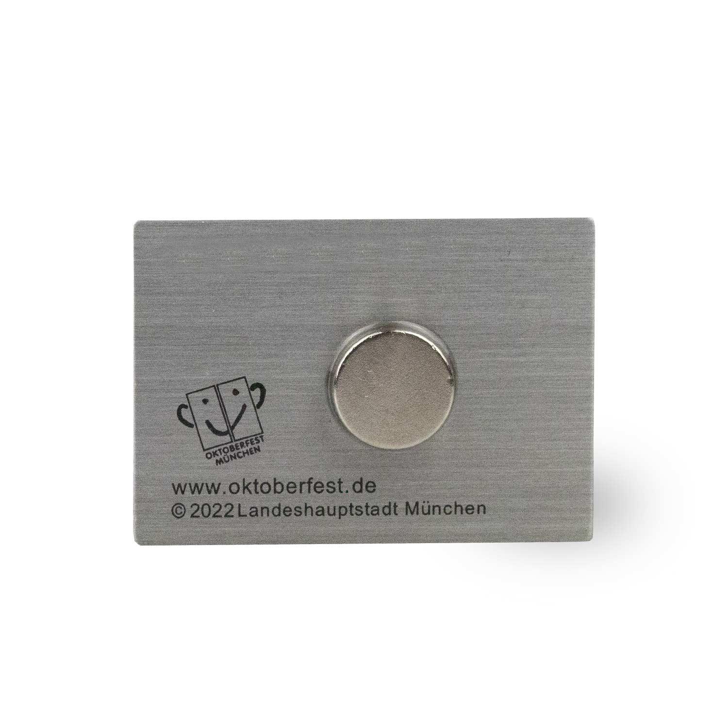 Rechteckiger Kühlschrankmagnet mit dem offiziellen Oktoberfestplakat 2022, farbig bedruckt, ca. 2,8 × 4 cm.