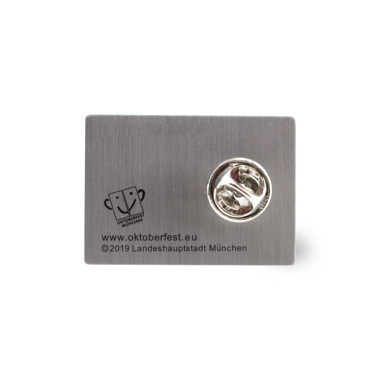 Offizieller Oktoberfest-Pin 2020 mit buntem Wiesn-Motiv in Form eines Herzens aus Metall, ca. 2,5 x 4 cm.