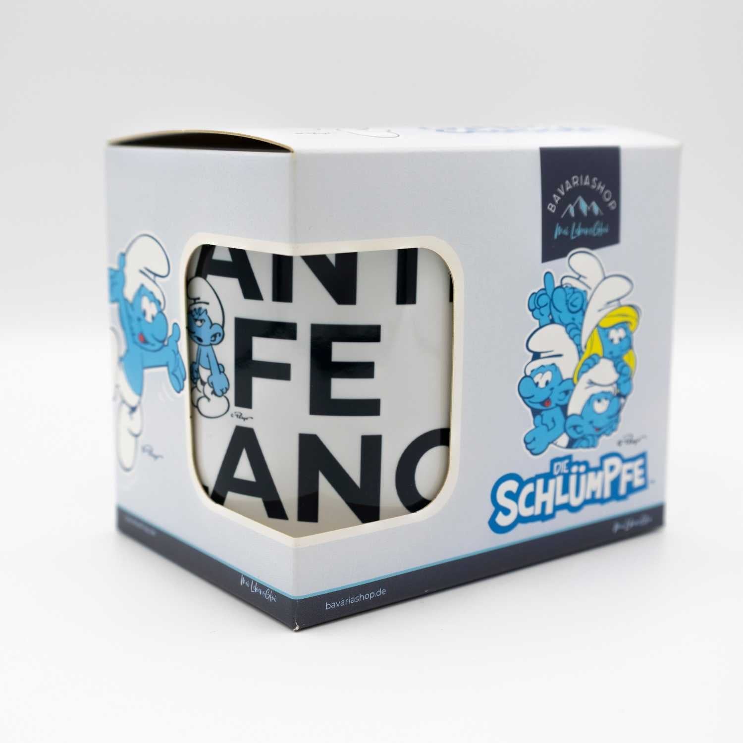 ®Die Schlümpfe Emailletasse Grantl life balance in Kartonverpackung mit Schlümpfe-Motiven und Schriftzug.