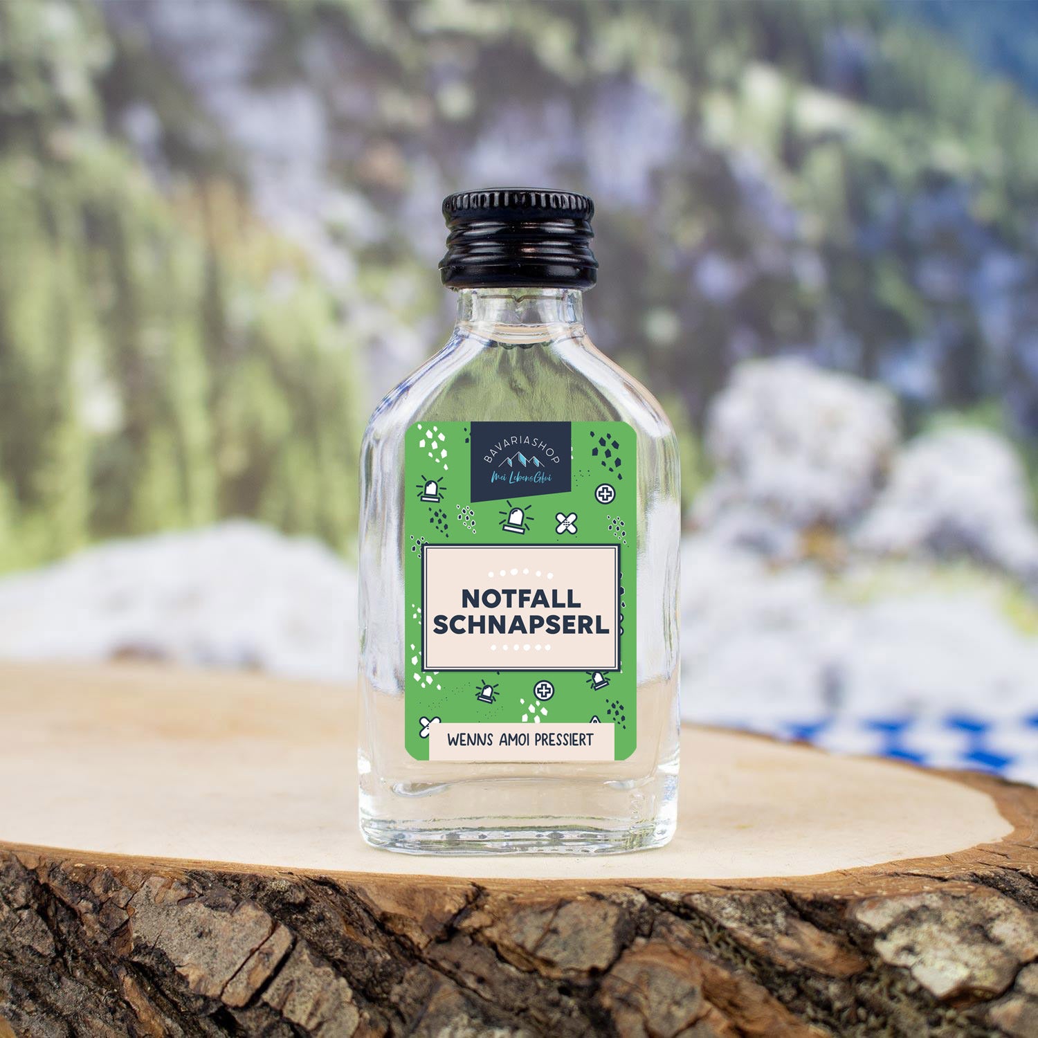 Kleine Glasflasche mit Obstler, 38 % vol., Etikett mit Motiv „Notfall Schnapserl“, Inhalt: 20 ml