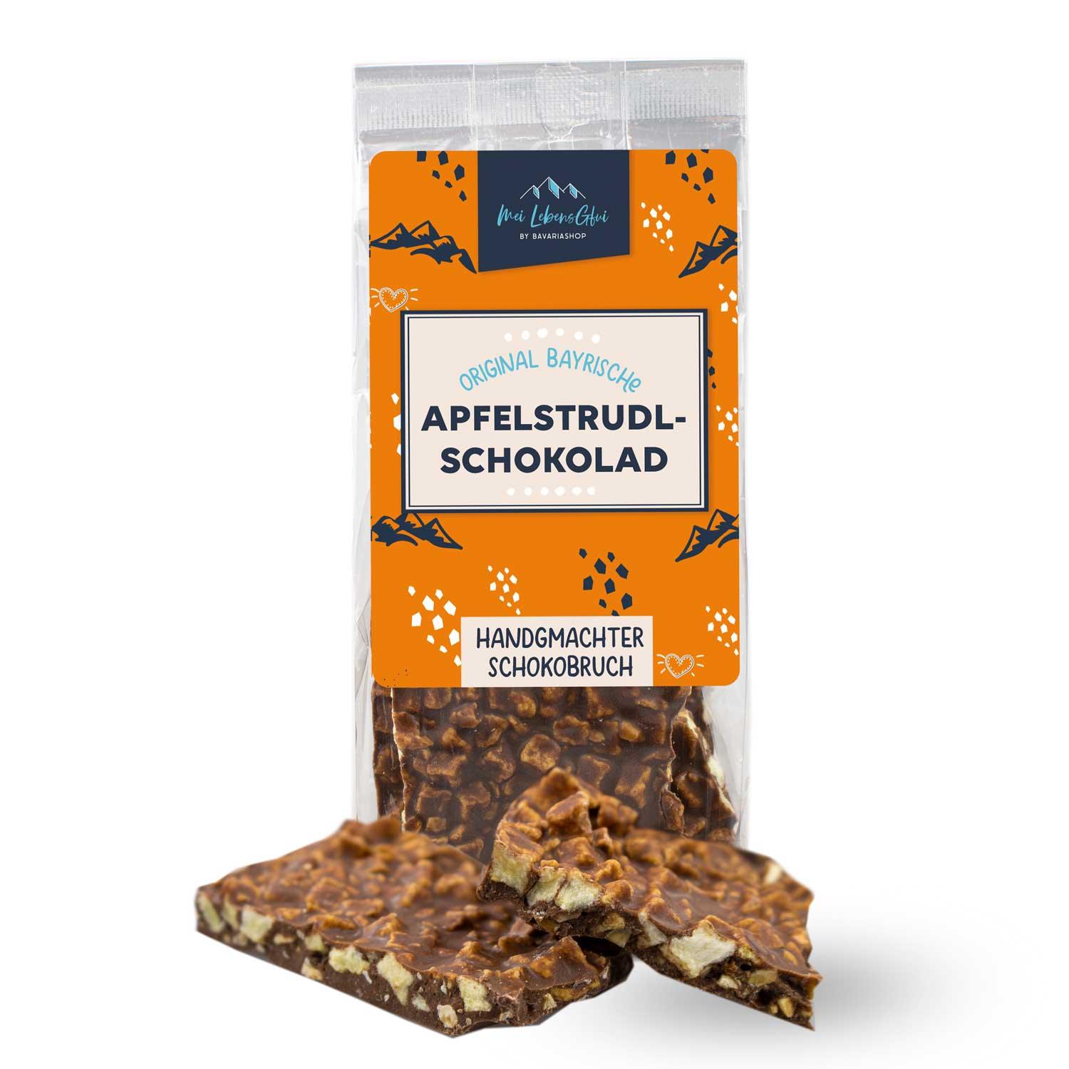 Vollmilch-Bruchschokolade mit sichtbaren Apfelstücken und Mandelsplittern, handgemacht, unregelmäßige Form, 150 g.
