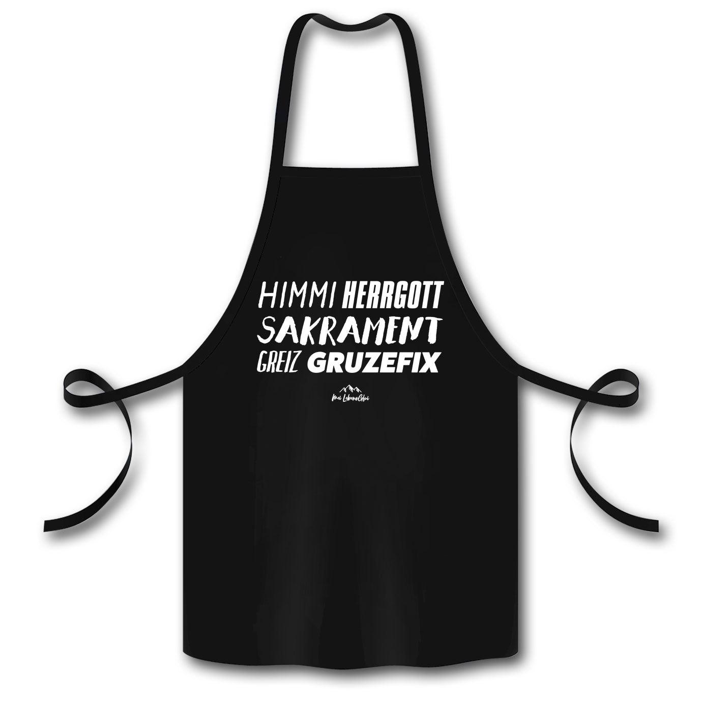 Küchenschürze mit aufgedrucktem Schriftzug „Himmiherrgottsakrament...“, aus 100 % Bio-Baumwolle, ca. 60 × 87 cm.