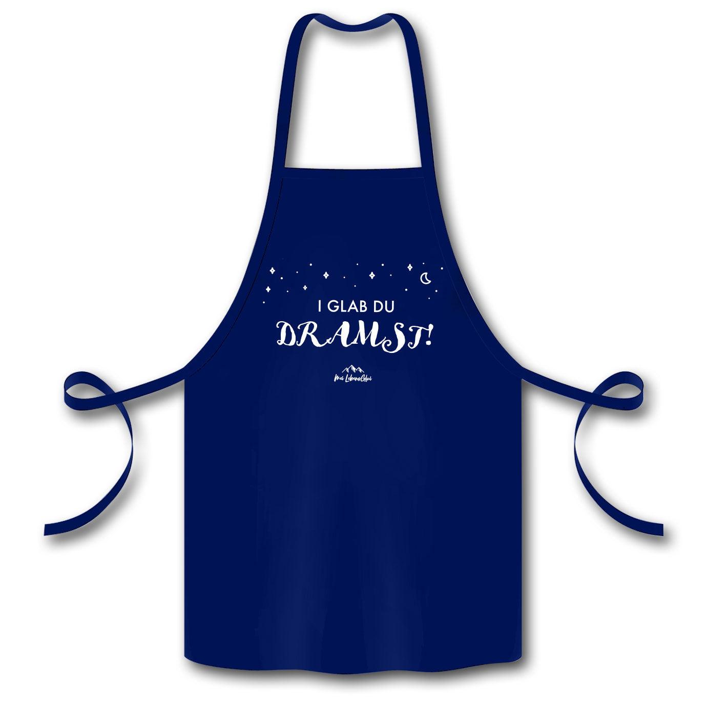 Schürze mit weißem Schriftzug „I glab du dramst!“ auf unifarbener Vorderseite aus 100 % Bio-Baumwolle.
