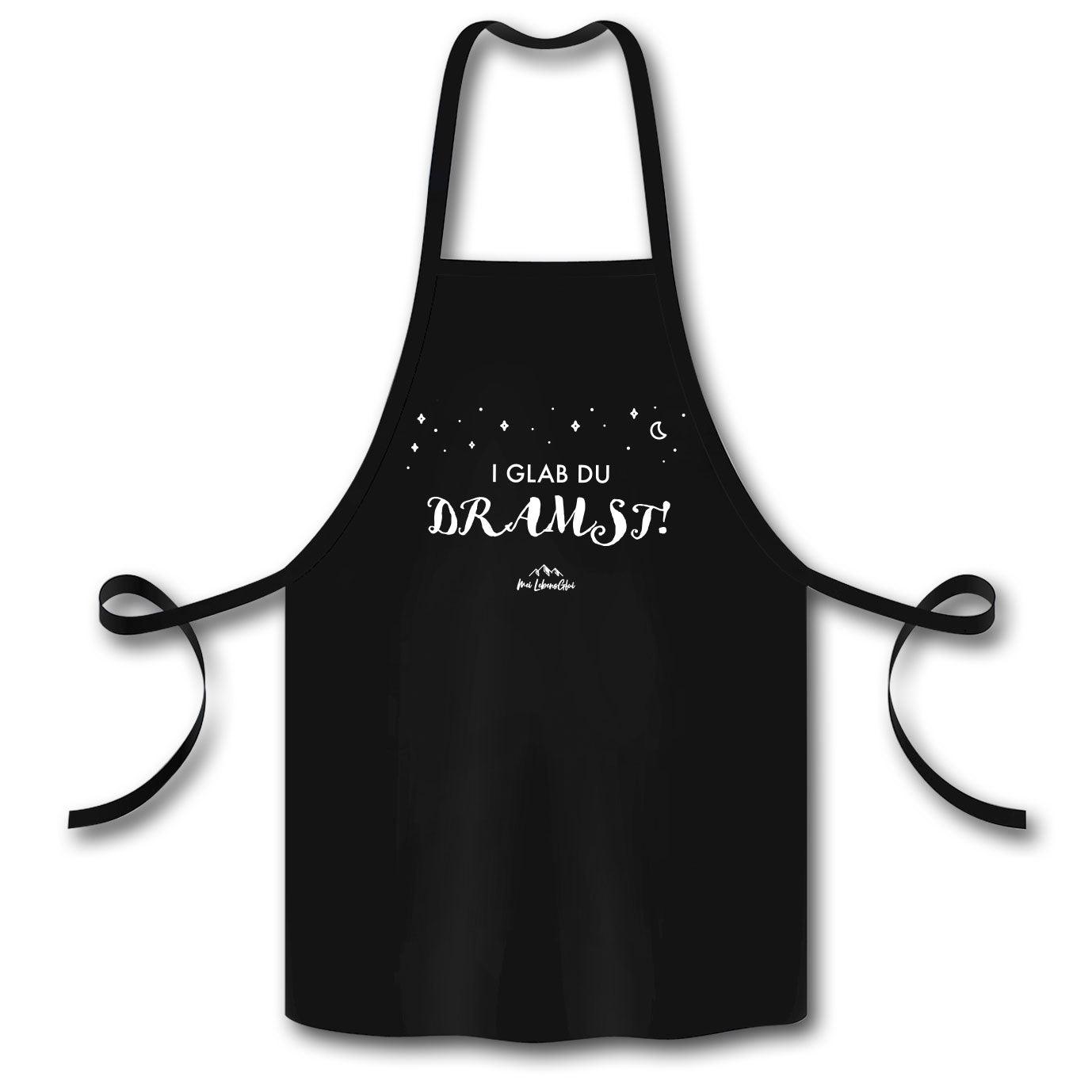 Kochschürze mit weißem Schriftzug „I glab du dramst!“ auf schwarzem Stoff aus 100 % Bio-Baumwolle.