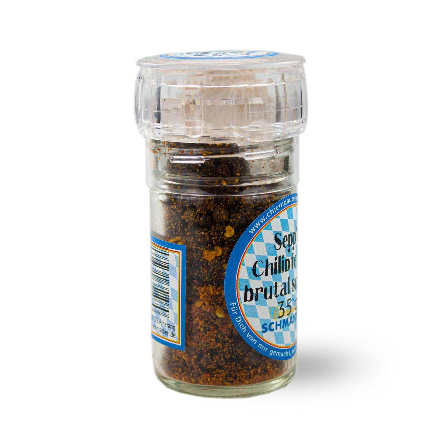 Grober, roter Chilipfeffer in transparenter Mühle mit schwarzem Deckel, Inhalt 35 g, brutal scharf.