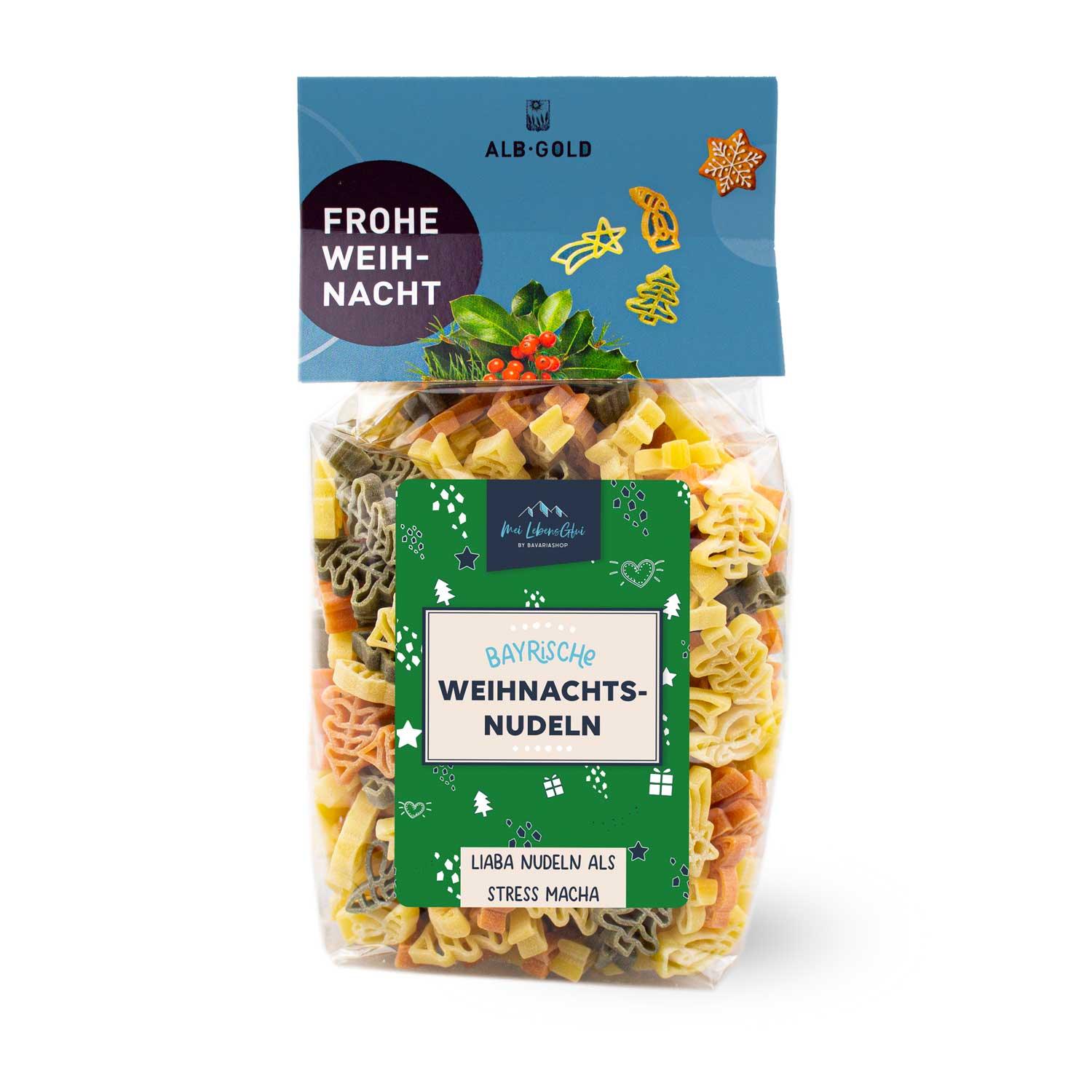 Dreifarbige Nudeln in Form von Weihnachtsmotiven wie Sternen, Tannenbäumen und Glocken aus Hartweizengrieß.